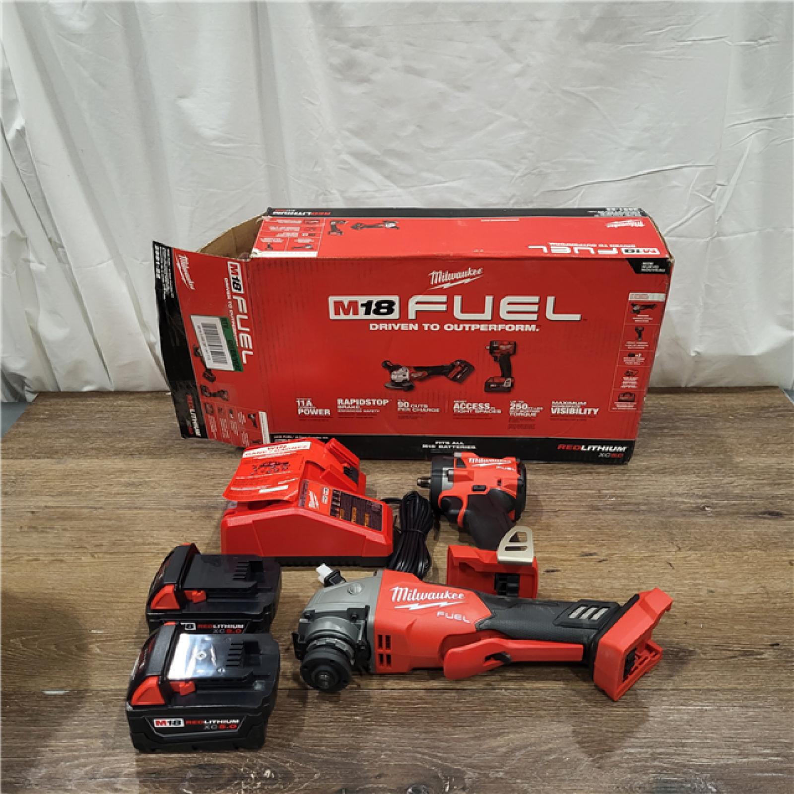 AS-IS M18 FUEL 18V Lithium-Ion Brushless Cordless Grinder & 3/8 in. Impact Wrench Combo Kit (2-Tool) W/ Two 5Ah Batteries