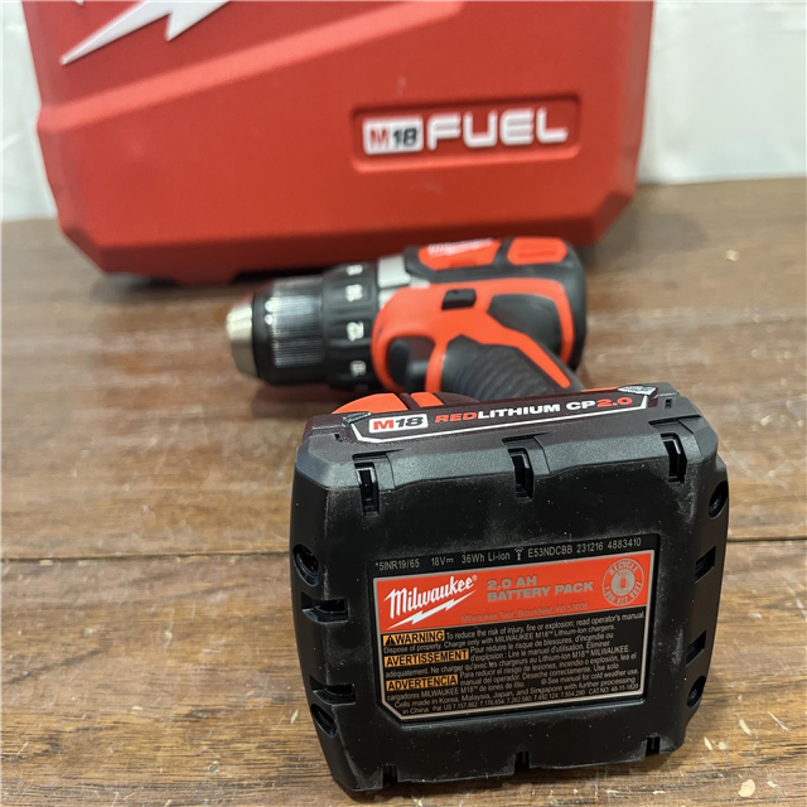 AS-ISMilwaukee 2904-22 Hammer Drill Driver Kit with Batteries  Charger & Tool Case  Red