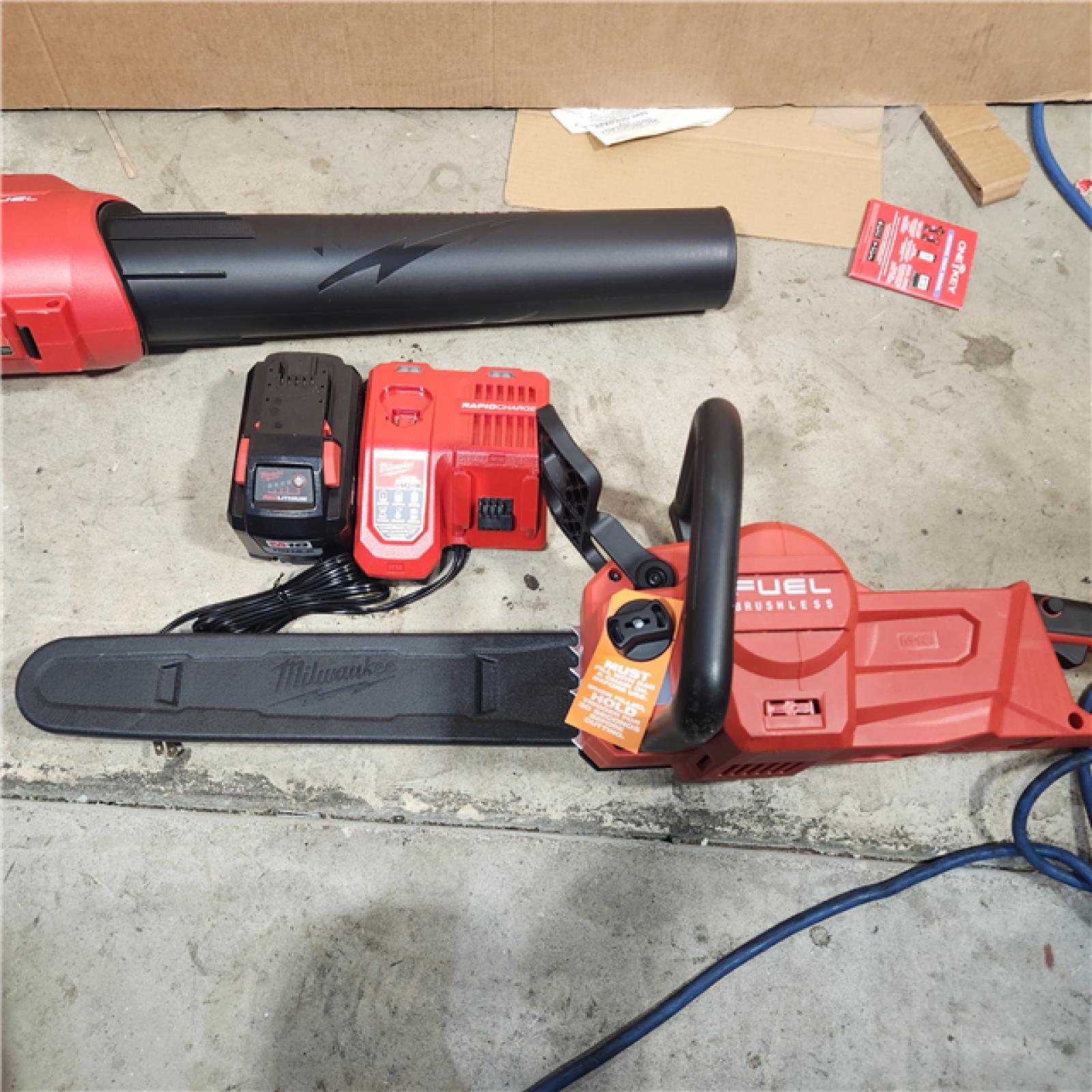 Houston location- AS-IS Milwaukee 2727-21HDP M18 18V FUEL Lithium-Ion Brushless Cordless 2-Tool Combo Kit with 16 Chainsaw and Handheld Blower 12.0 Ah