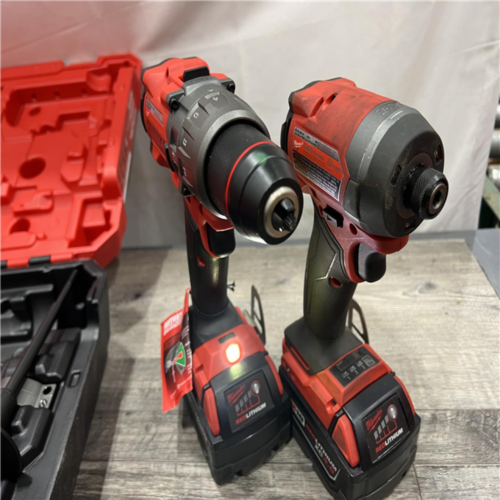 AS-IS Milwaukee M18 FUEL 18V Lithium-Ion Brushless Cordless Hammer Drill and Impact Driver Combo Kit (2-Tool) with 2 Batteries