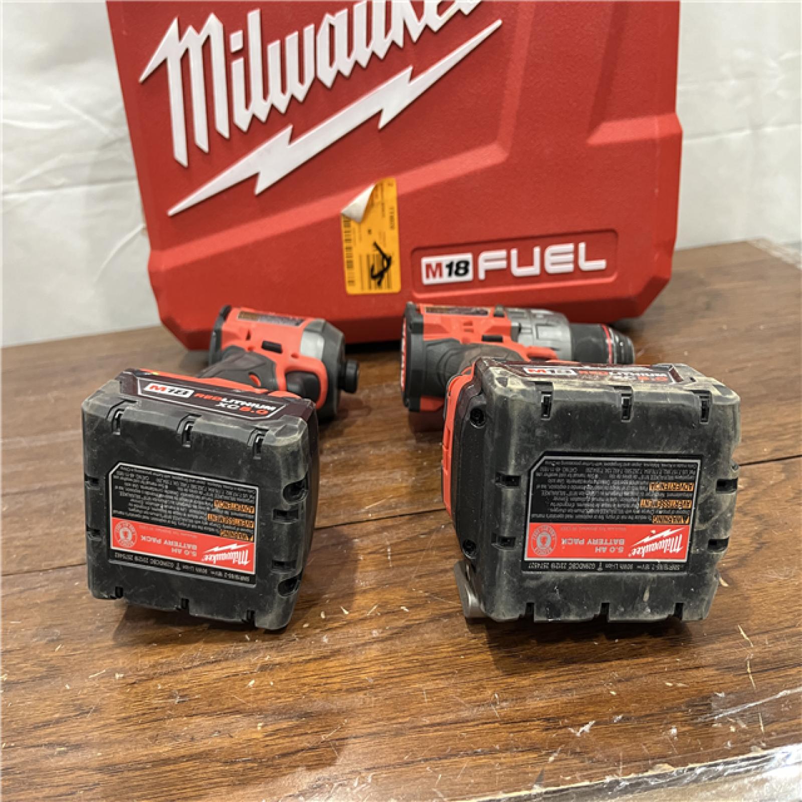 AS-IS Milwaukee M18 FUEL 18V Lithium-Ion Brushless Cordless Hammer Drill and Impact Driver Combo Kit (2-Tool) with 2 Batteries