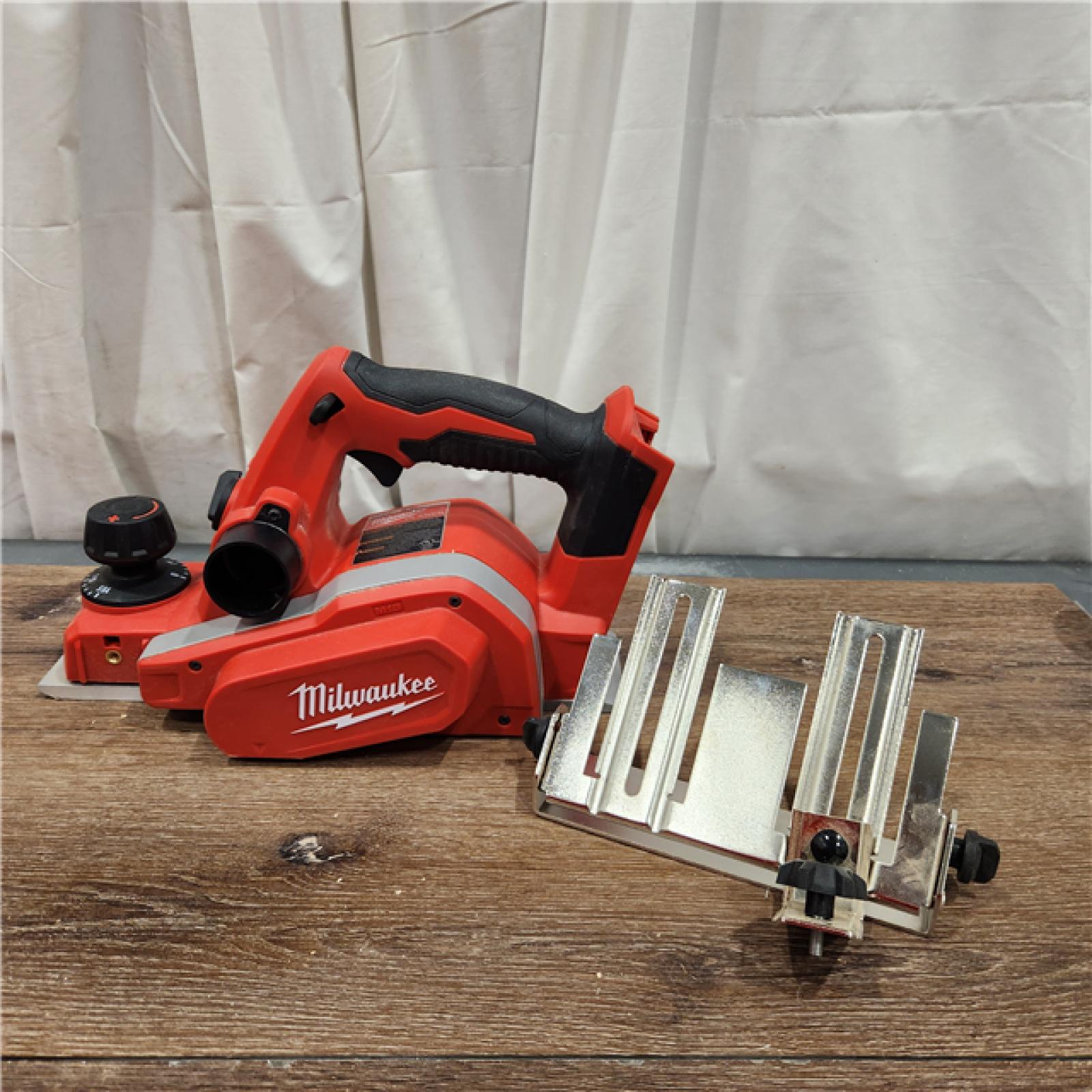 AS-IS Milwaukee M18 18-Volt Lithium-Ion Cordless 3-1/4 in. Planer (Tool-Only)