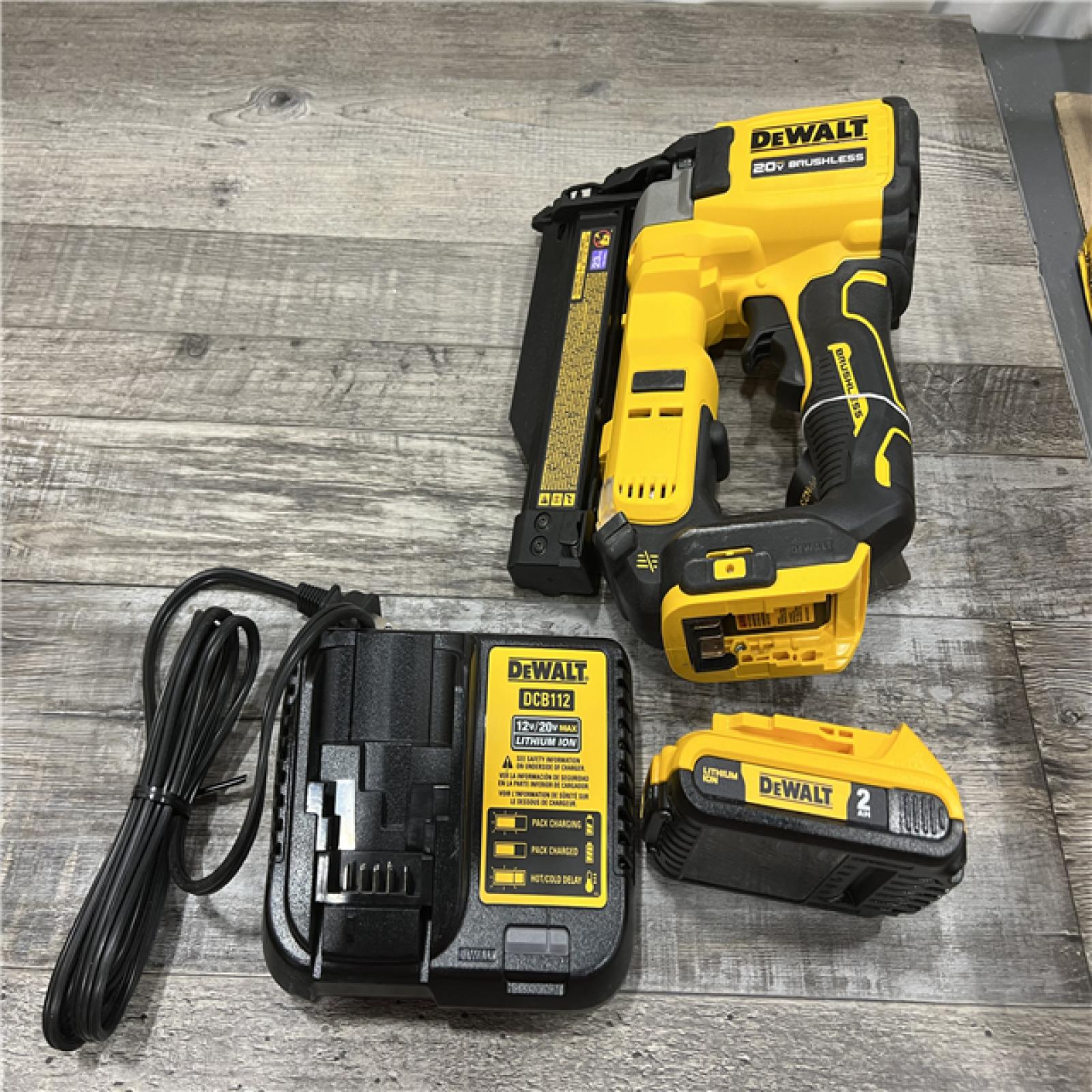 AS-IS DEWALT ATOMIC 20V MAX Lithium Ion Cordless 23 Gauge Pin Nailer Kit with 2.0Ah Battery and Charger