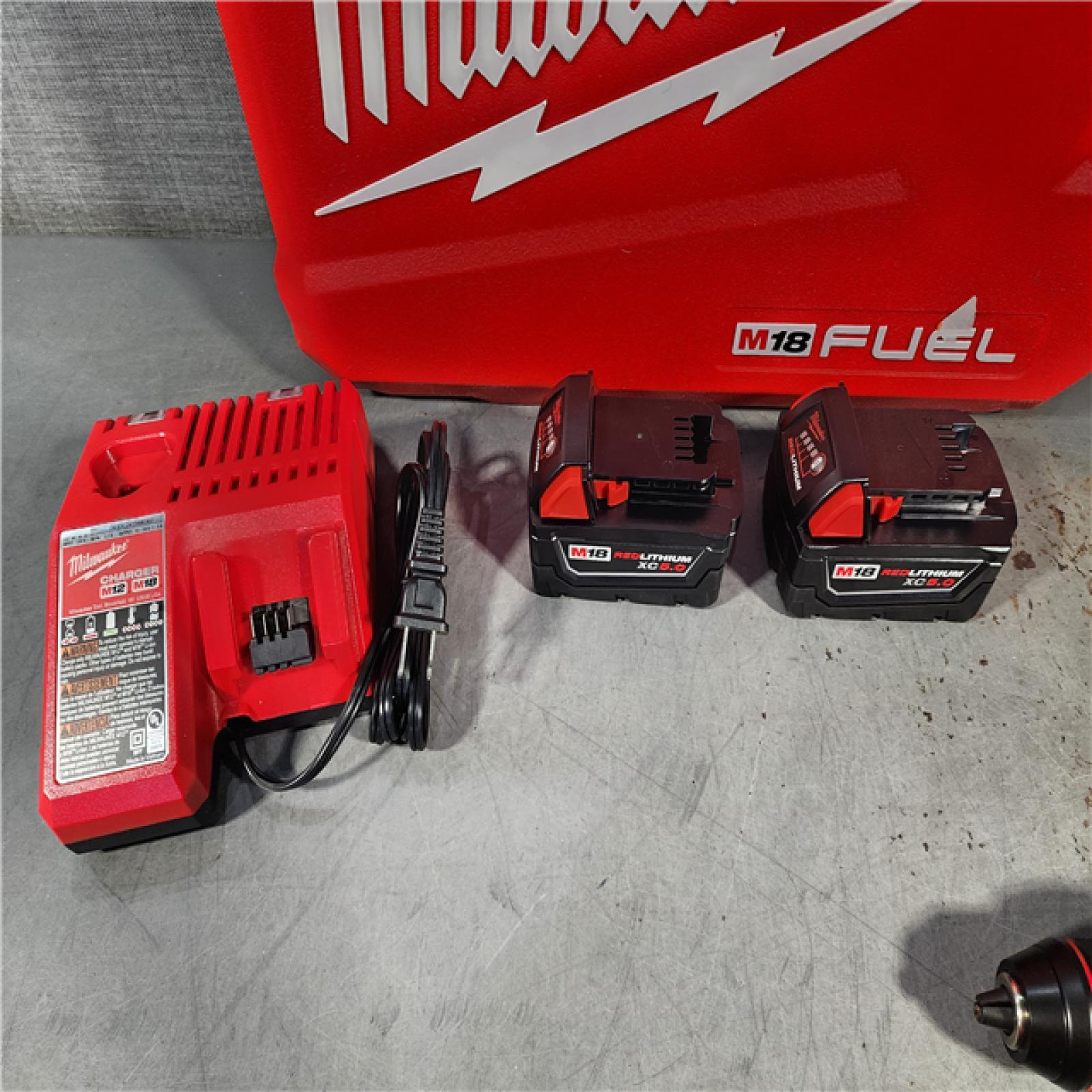 HOUSTON LOCATION - AS-IS (APPEARS LIKE NEW) Milwaukee M18 FUEL 18V Lithium-Ion Brushless Cordless Hammer Drill and Impact Driver Combo Kit (2-Tool) with 2 Batteries