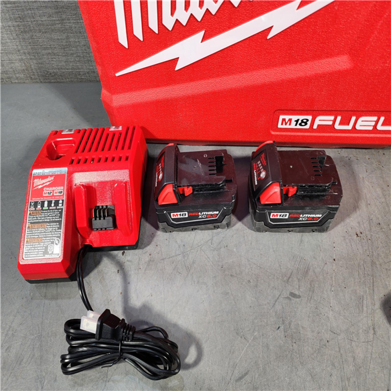 HOUSTON LOCATION - AS-IS (APPEARS LIKE NEW) Milwaukee M18 FUEL 18V Lithium-Ion Brushless Cordless Hammer Drill and Impact Driver Combo Kit (2-Tool) with 2 Batteries