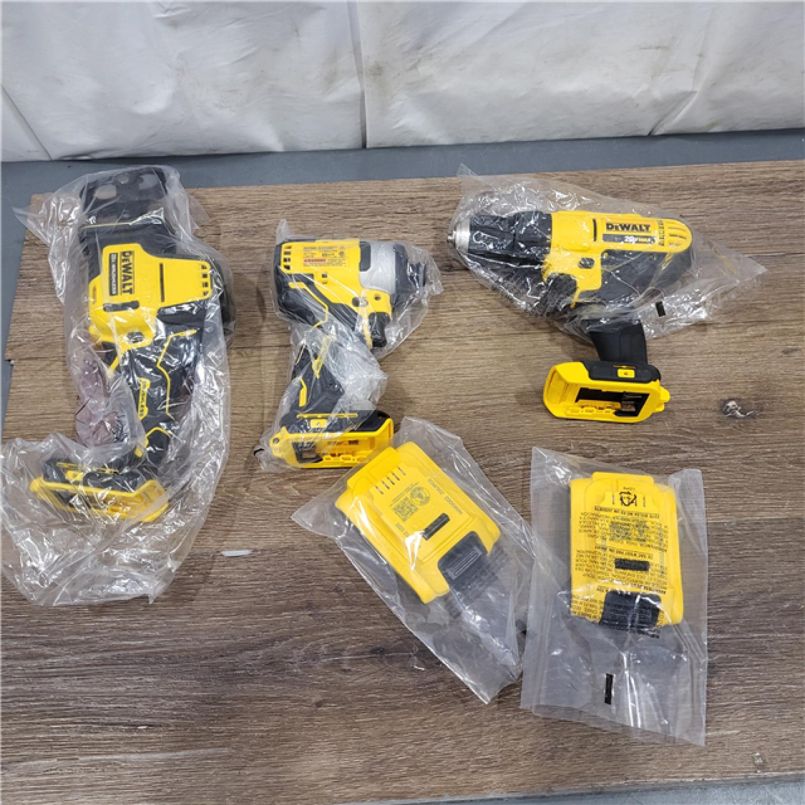 New AS-IS DeWalt 20V MAX ATOMIC Cordless Brushless 4 Tool Combo Kit