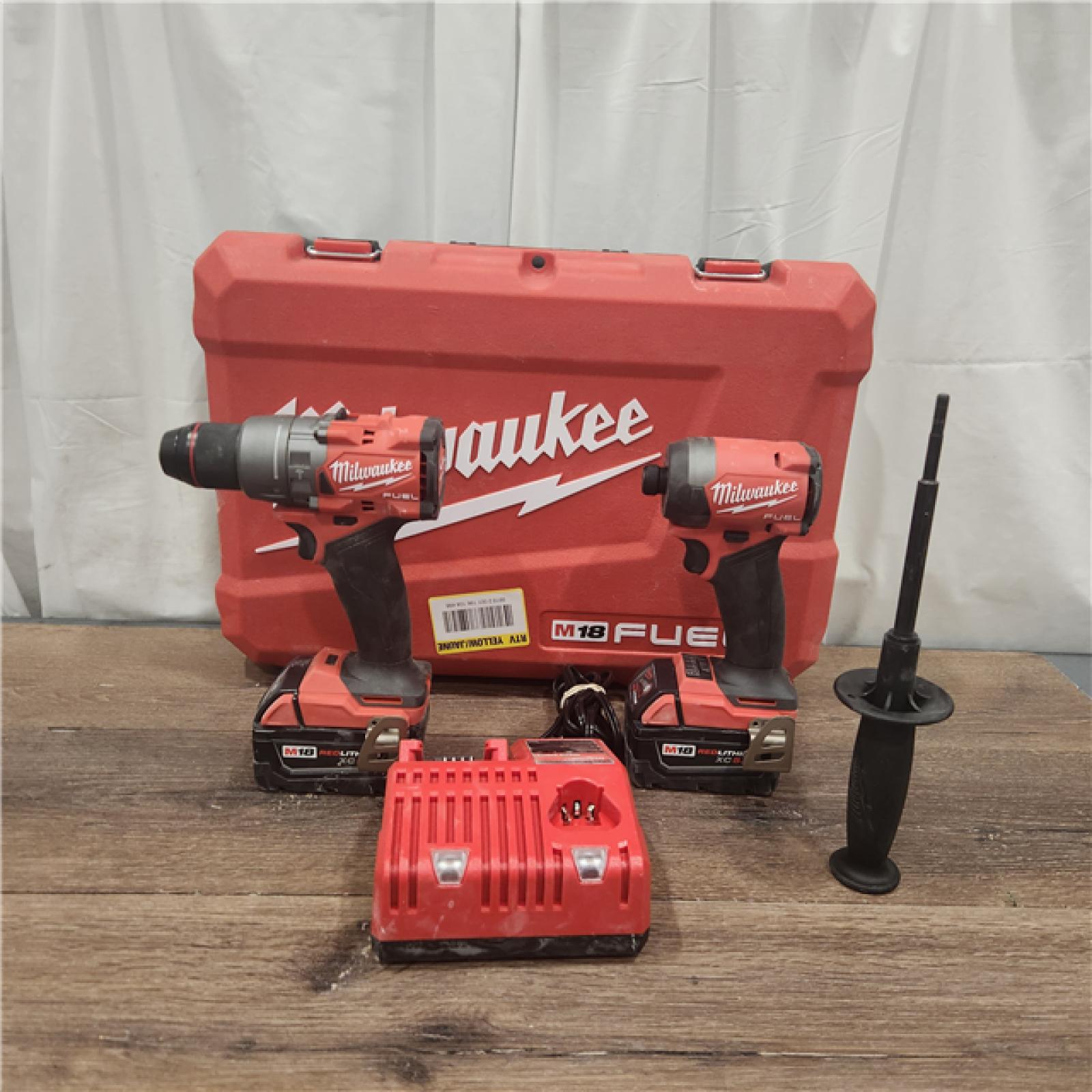 AS IS Milwaukee M18 FUEL 18V Lithium-Ion Brushless Cordless Hammer Drill and Impact Driver Combo Kit (2-Tool) with 2 Batteries