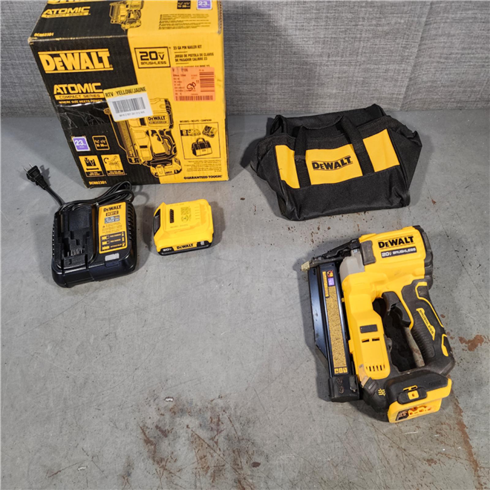 HOUSTON LOCATION - AS-IS DEWALT ATOMIC 20V MAX Lithium Ion Cordless 23 Gauge Pin Nailer Kit with 2.0Ah Battery and Charger