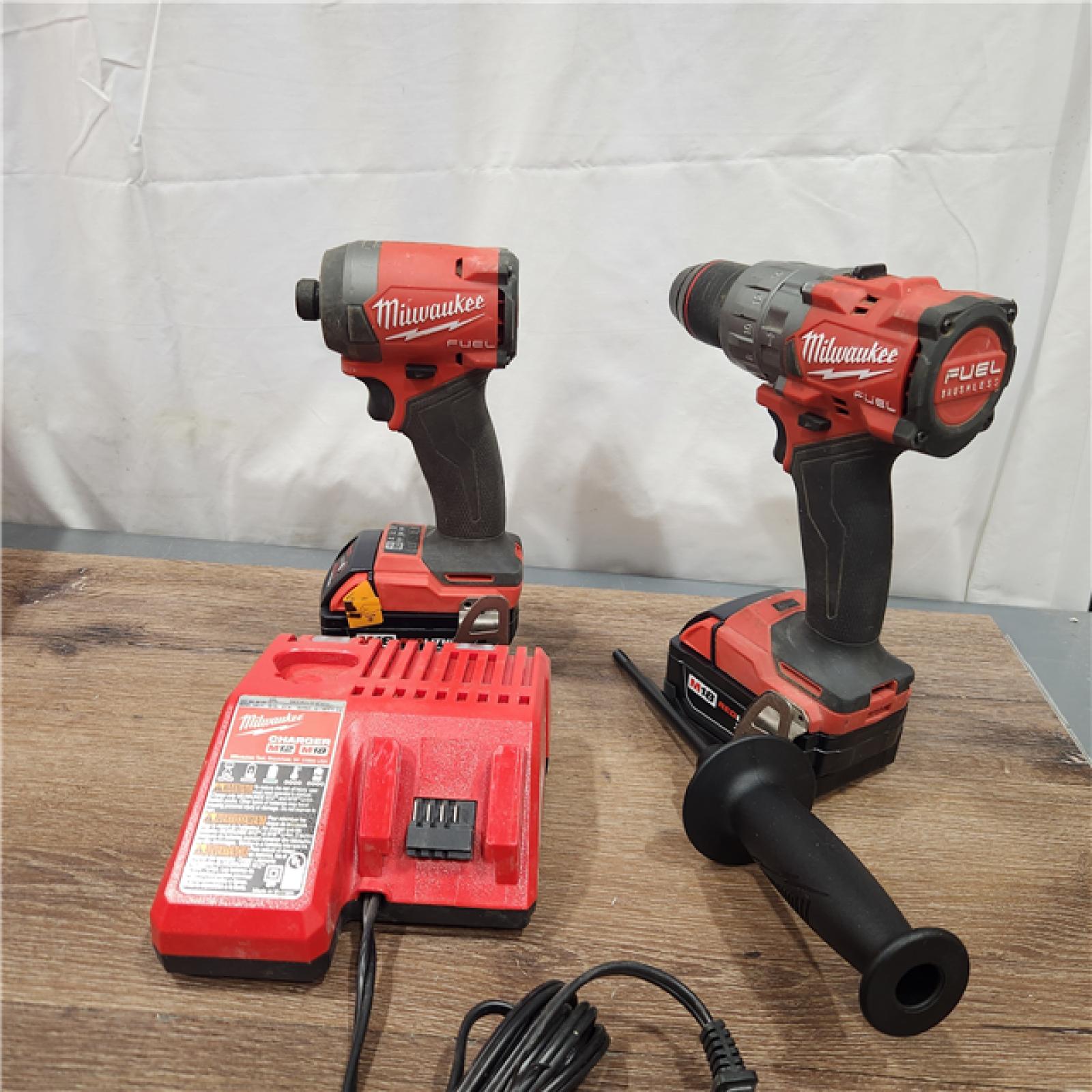 AS-IS Milwaukee M18 FUEL 18V Lithium-Ion Brushless Cordless Hammer Drill and Impact Driver Combo Kit (2-Tool) with 2 Batteries