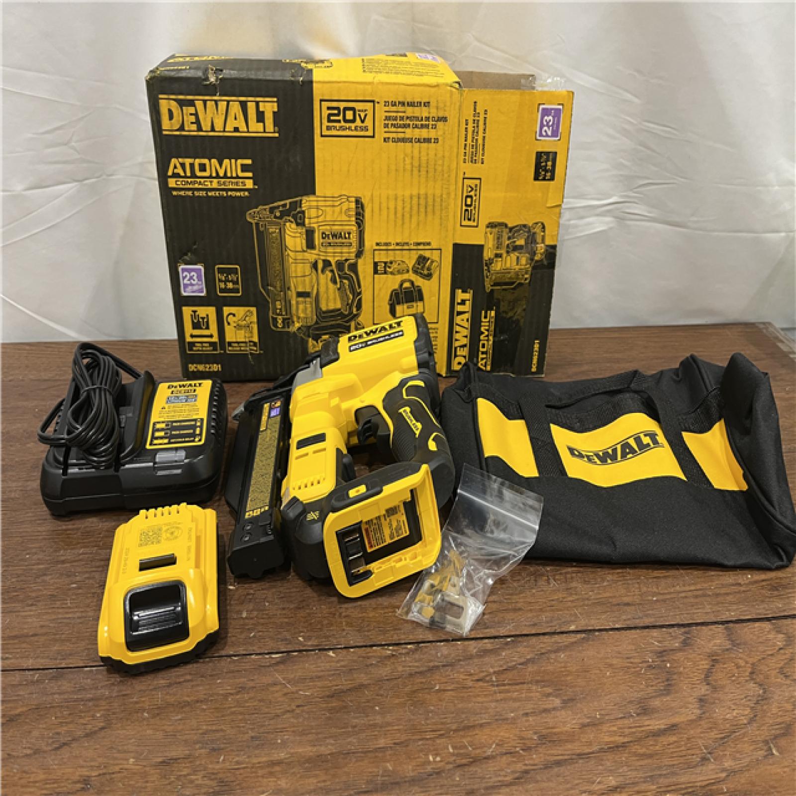 AS-ISDeWalt DCN623D1 20-Volt MAX Atomic Compact Cordless Pin Nailer Kit  Brushless Motor  23 Gauge  Battery - Quantity 1