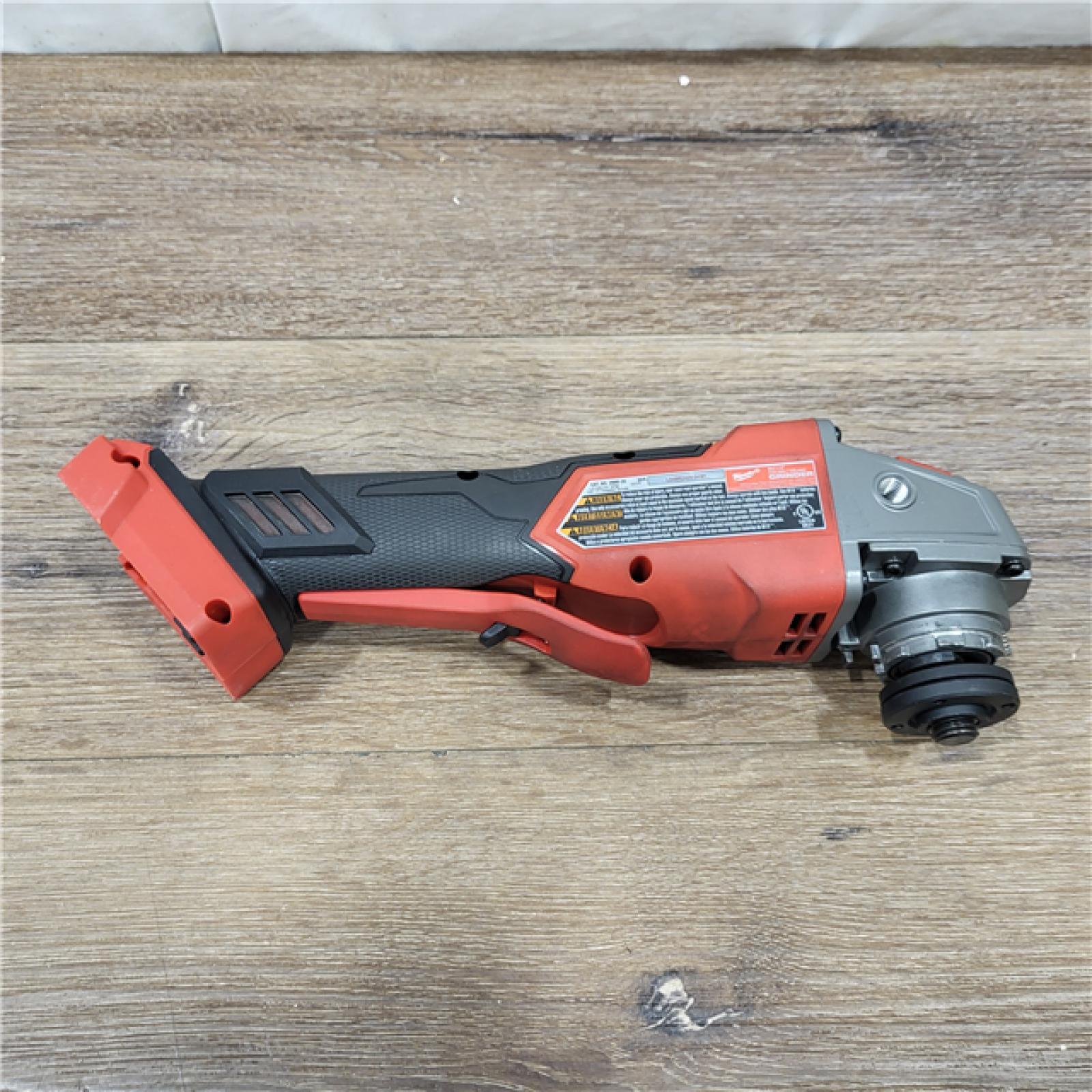 AS-IS Milwaukee 2880-20 M18 FUEL 18-Volt Lithium-Ion Brushless Cordless 4-1/2 in./5 in. Grinder W/Paddle Switch (Tool-Only)