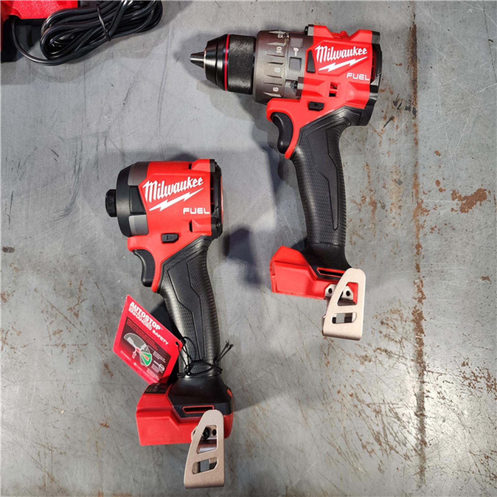 HOUSTON LOCATION - AS-IS (APPEARS LIKE NEW) Milwaukee M18 FUEL 18V Lithium-Ion Brushless Cordless Hammer Drill and Impact Driver Combo Kit (2-Tool) with 2 Batteries