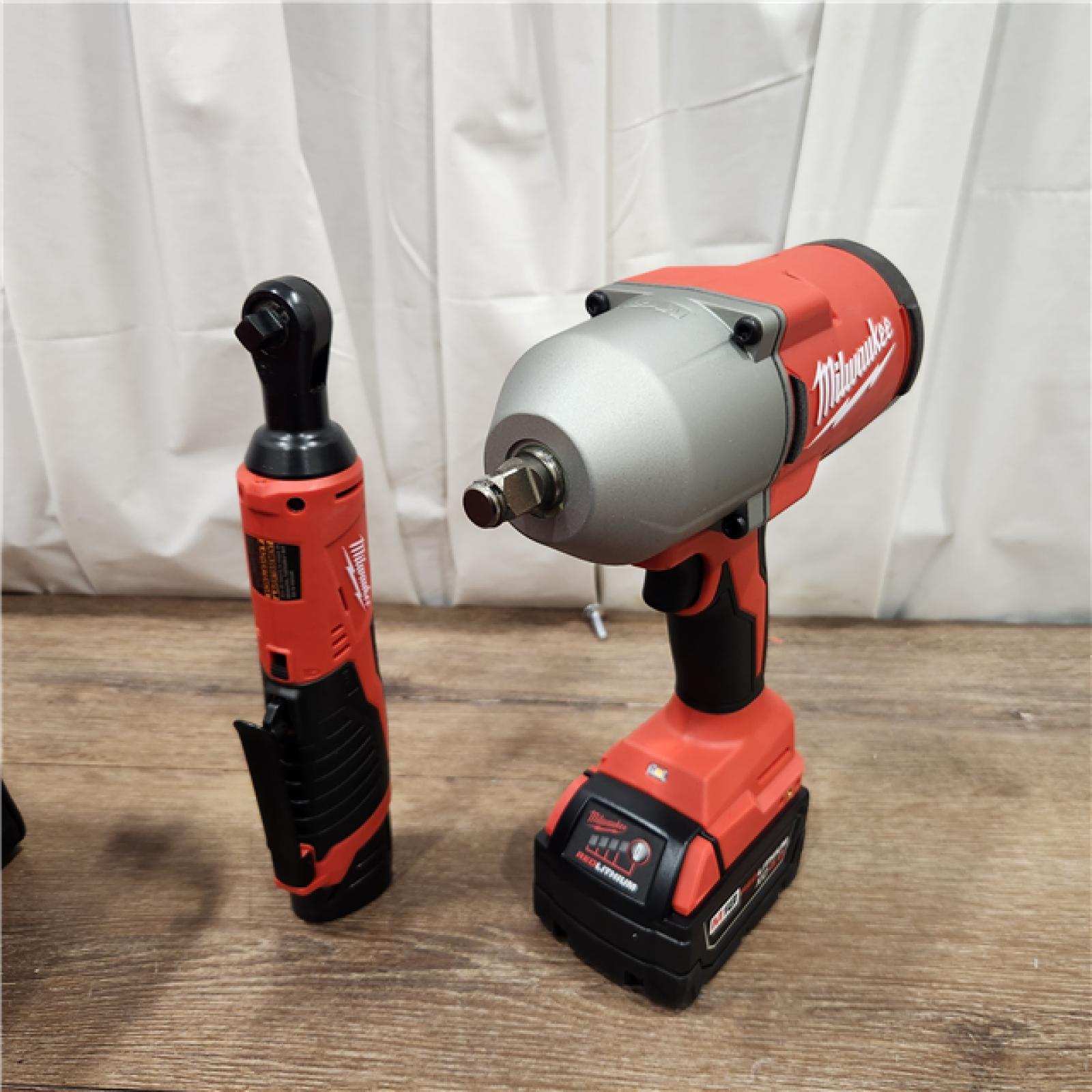 AS-IS M12/M18 12/18V Lithium-Ion Cordless 3/8 in. Ratchet and 1/2 in. High Torque Impact Wrench with Friction Ring Combo Kit