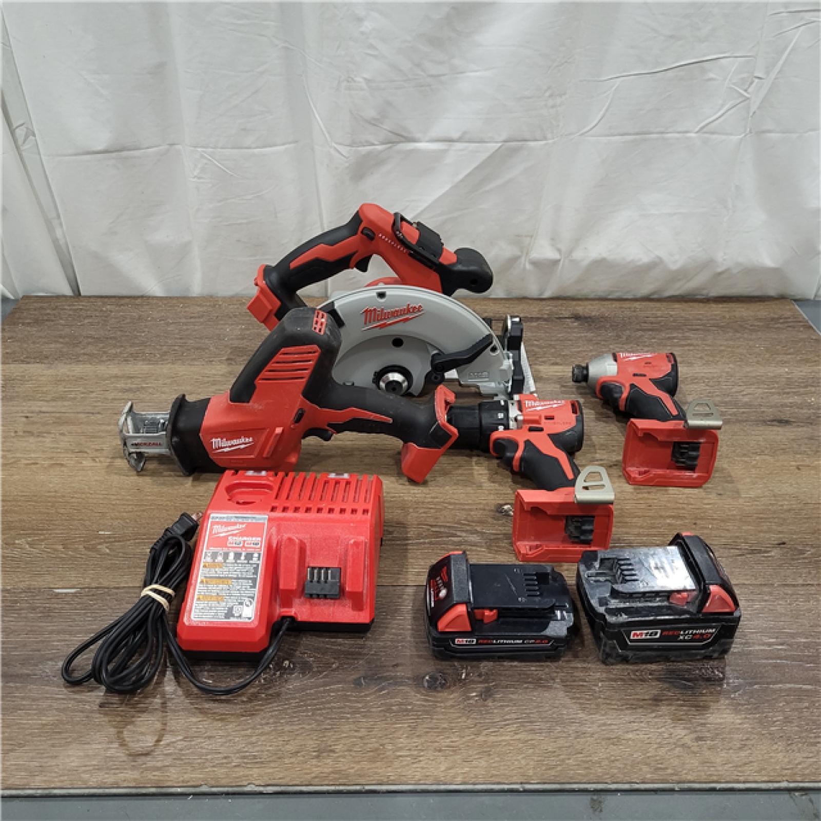 AS-IS M18 18-Volt Lithium-Ion Brushless Cordless Combo Kit (4-Tool) with 2-Batteries, 1-Charger and Tool Bag