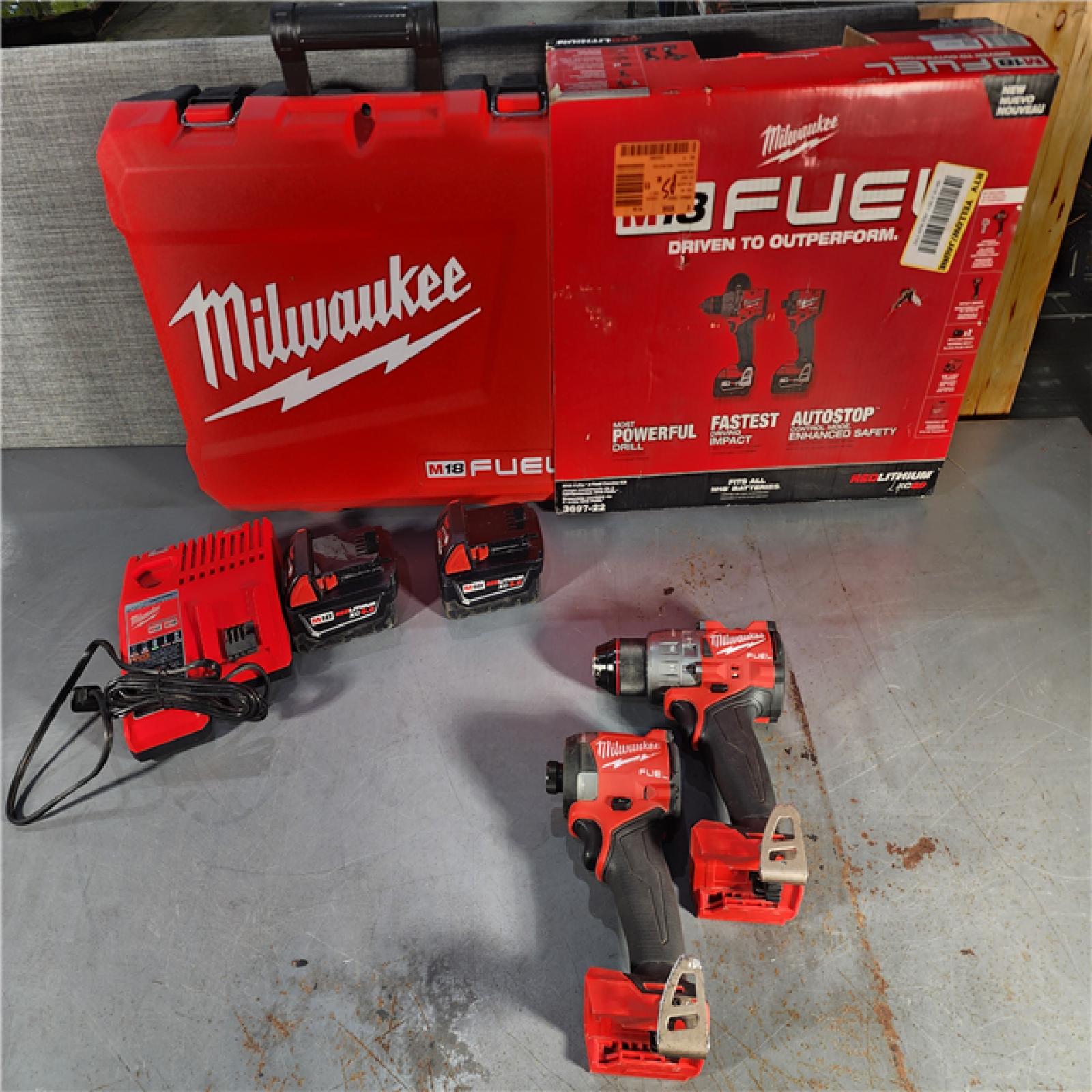 HOUSTON LOCATION - AS-IS Milwaukee M18 FUEL 18V Lithium-Ion Brushless Cordless Hammer Drill and Impact Driver Combo Kit (2-Tool) with 2 Batteries