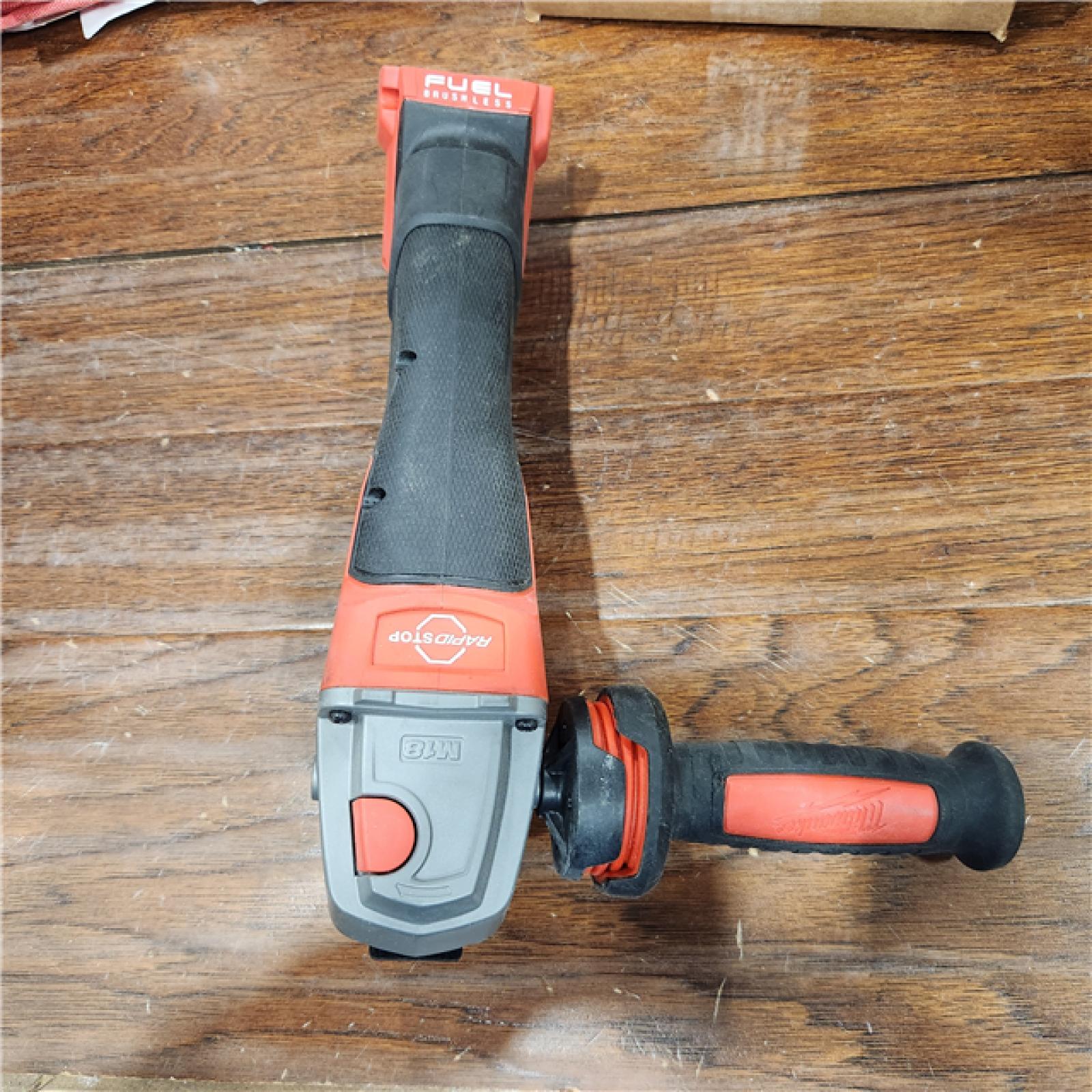 AS-IS Milwaukee 2880-20 M18 FUEL 18-Volt Lithium-Ion Brushless Cordless 4-1/2 in./5 in. Grinder W/Paddle Switch (Tool-Only)