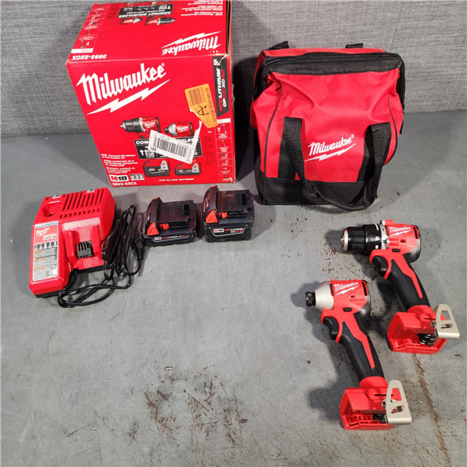 HOUSTON LOCATION - AS-IS M18 18-Volt Lithium-Ion Brushless Cordless Compact Hammer Drill/Impact Combo Kit (2-Tool) with (2) Batteries, Bag