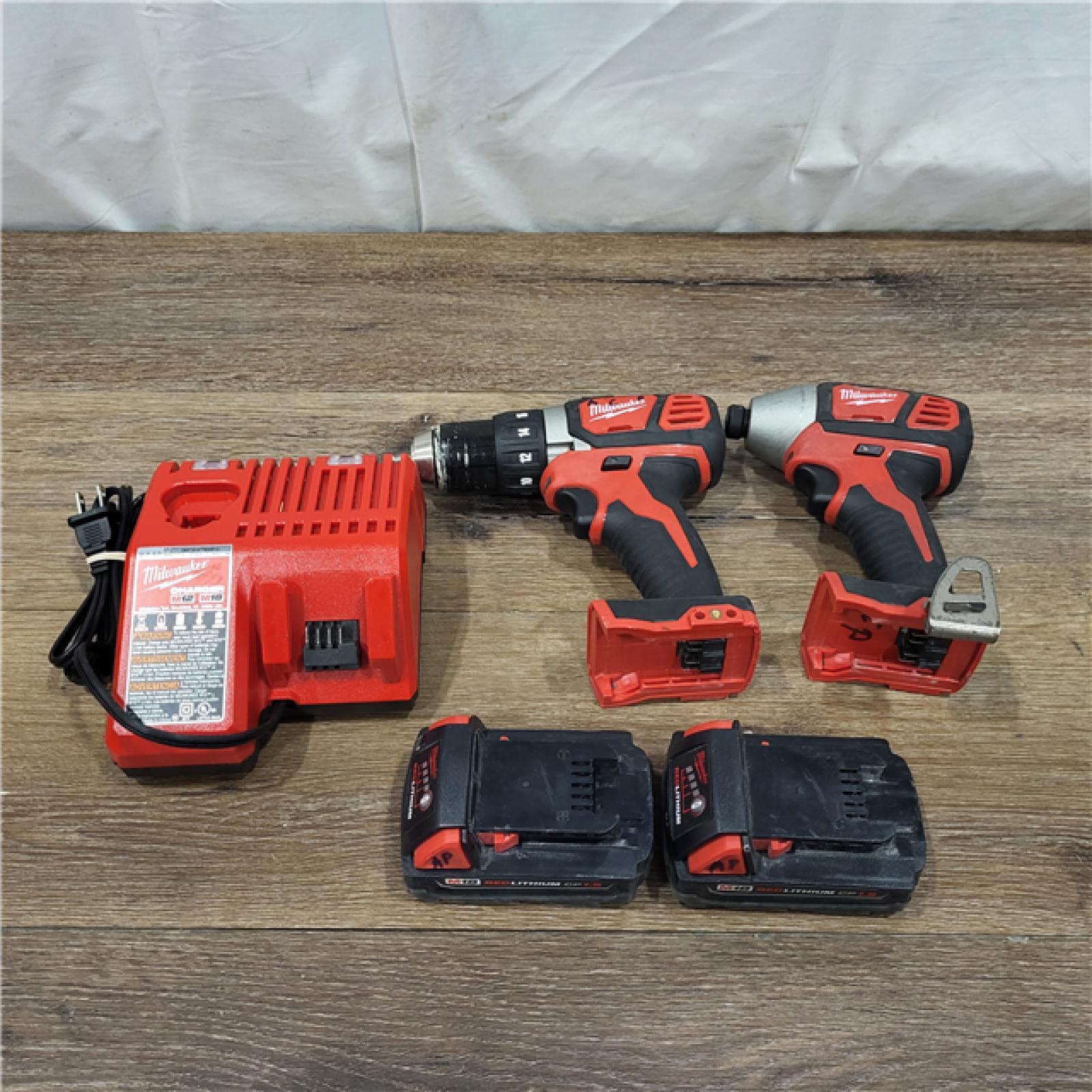 AS-IS Milwaukee M18 18V Cordless Brushed 2 Tool Drill/Driver and Impact Driver Kit