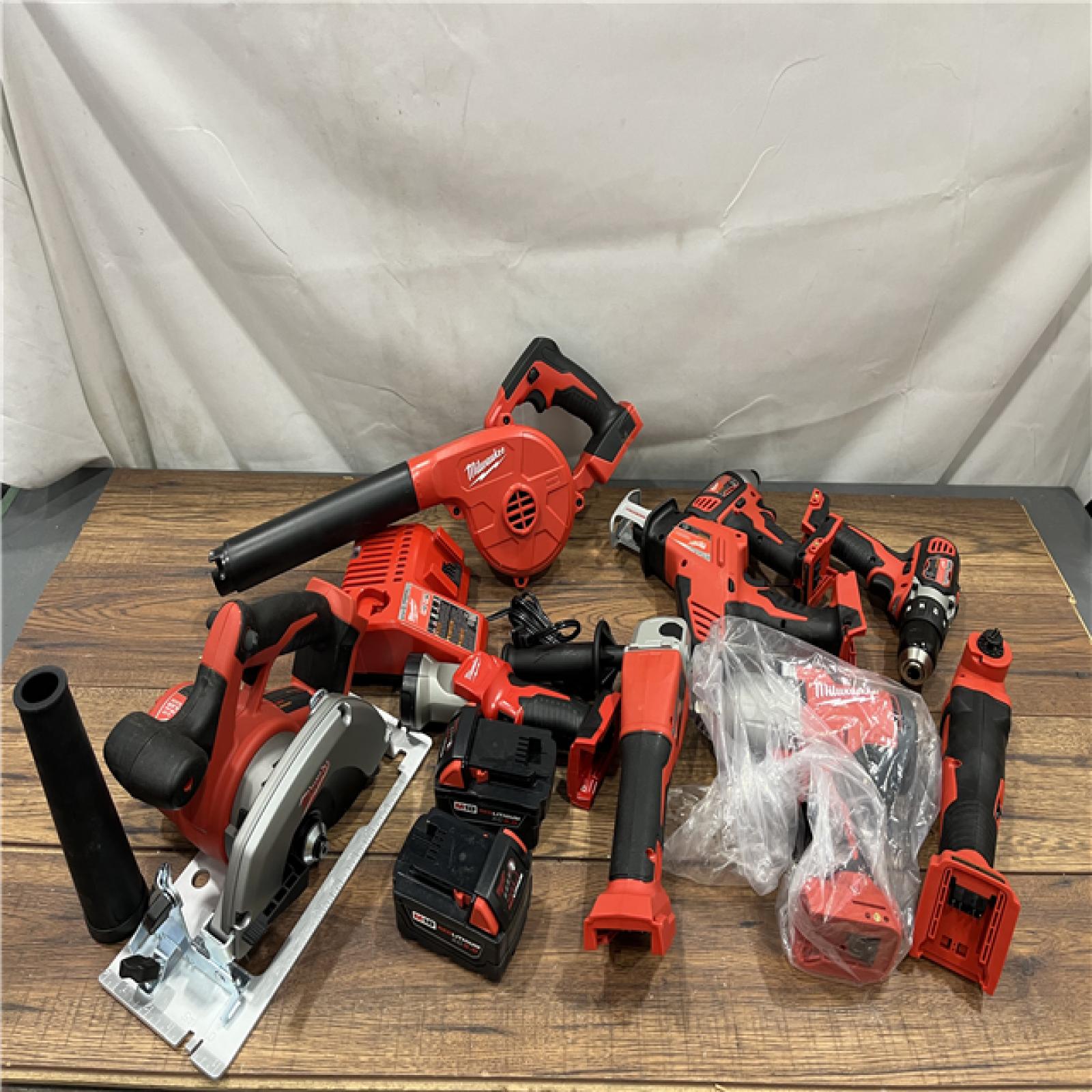 AS-IS Milwaukee M18 18-Volt Lithium-Ion Cordless Combo Kit (9-Tool) with (2) Batteries, Charger, and Tool Bag