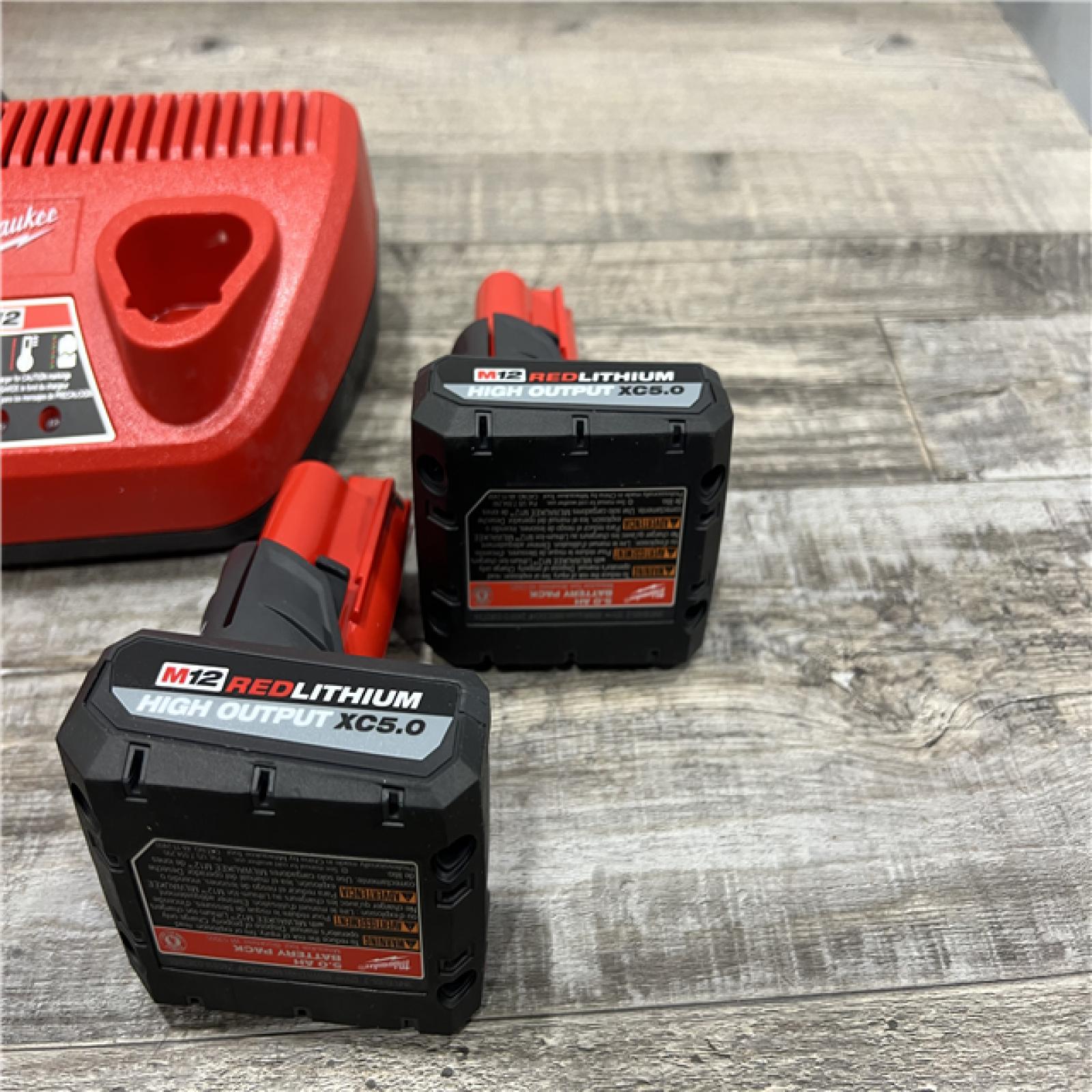 AS-IS Milwaukee M12 12V Lithium-Ion XC High Output 5.0 Ah Battery Pack (2-Pack) Starter Kit with Charger