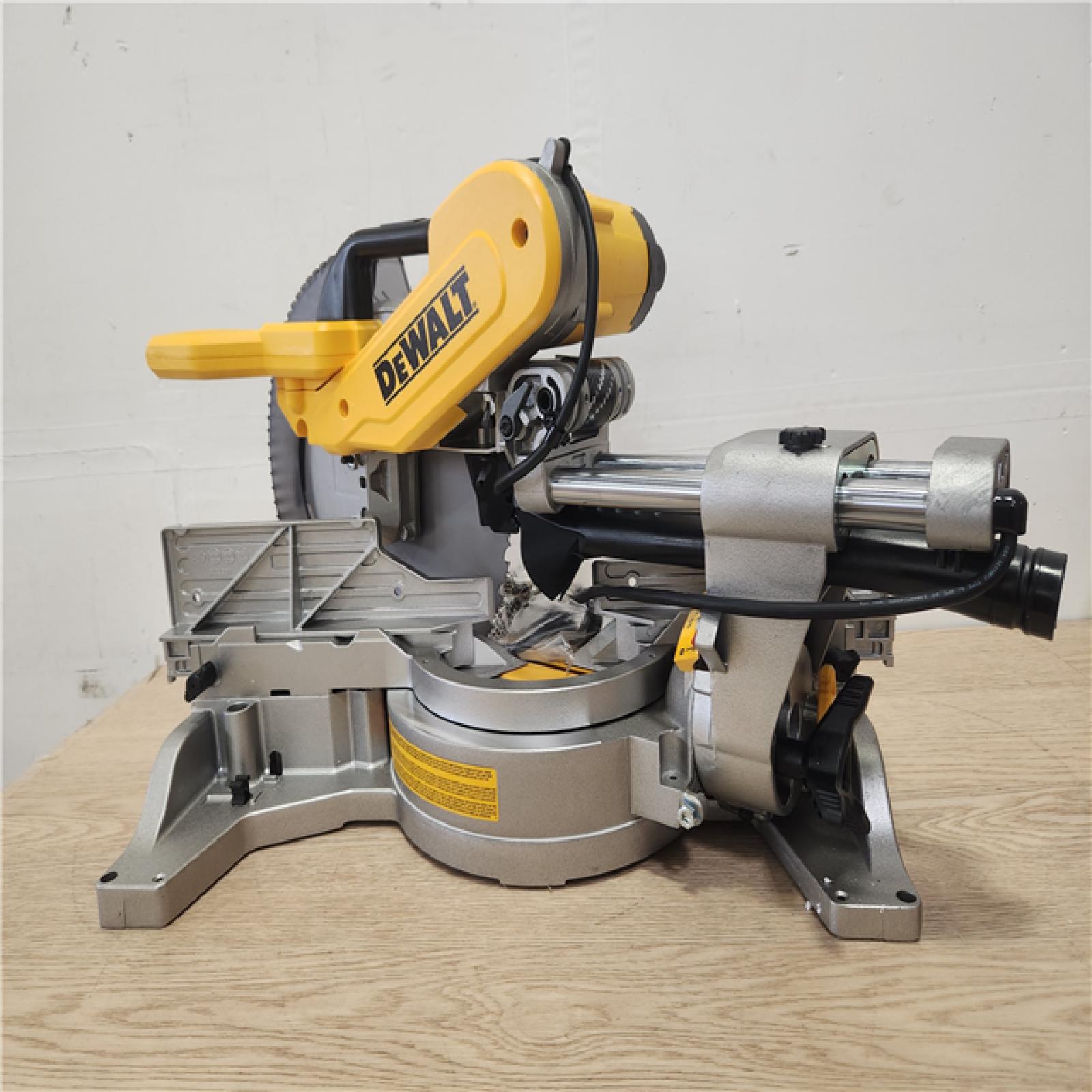 Phoenix Location Appears NEW DEWALT 15 Amp Corded 12 in. Double Bevel Sliding Compound Miter Saw, Blade Wrench and Material Clamp DWS779