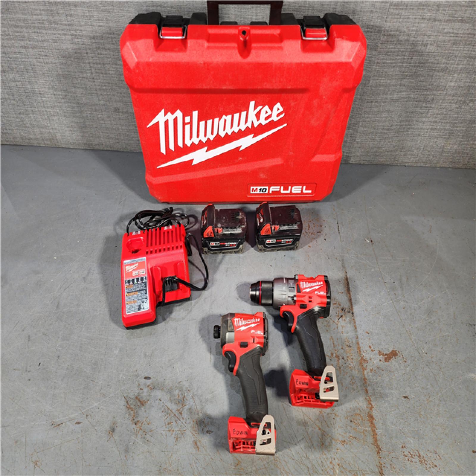 HOUSTON LOCATION - AS-IS Milwaukee M18 FUEL 18V Lithium-Ion Brushless Cordless Hammer Drill and Impact Driver Combo Kit (2-Tool) with 2 Batteries