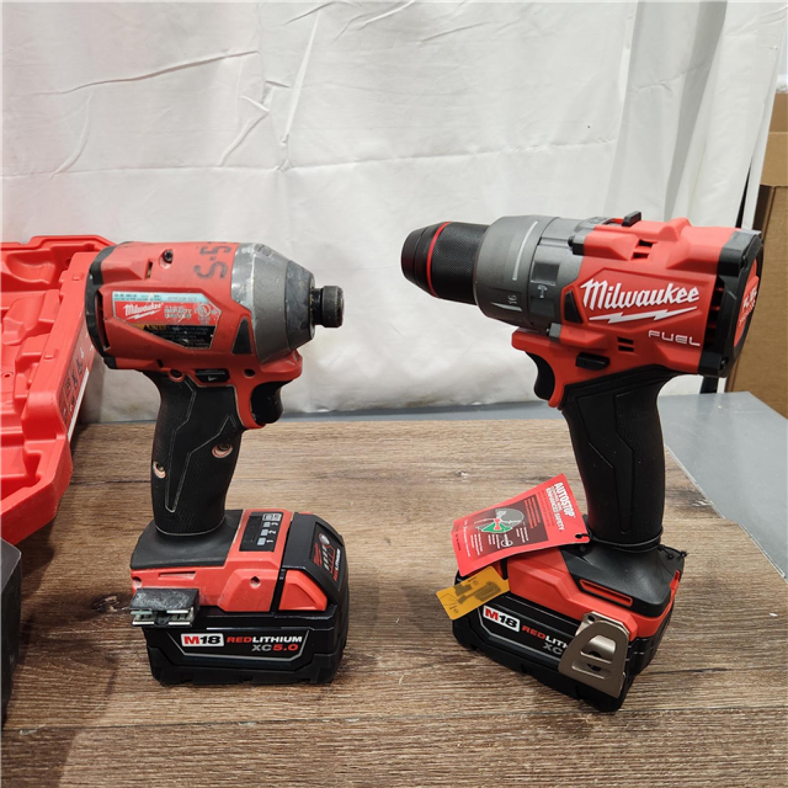 AS-IS Milwaukee M18 FUEL 18V Lithium-Ion Brushless Cordless Hammer Drill and Impact Driver Combo Kit (2-Tool) with 2 Batteries