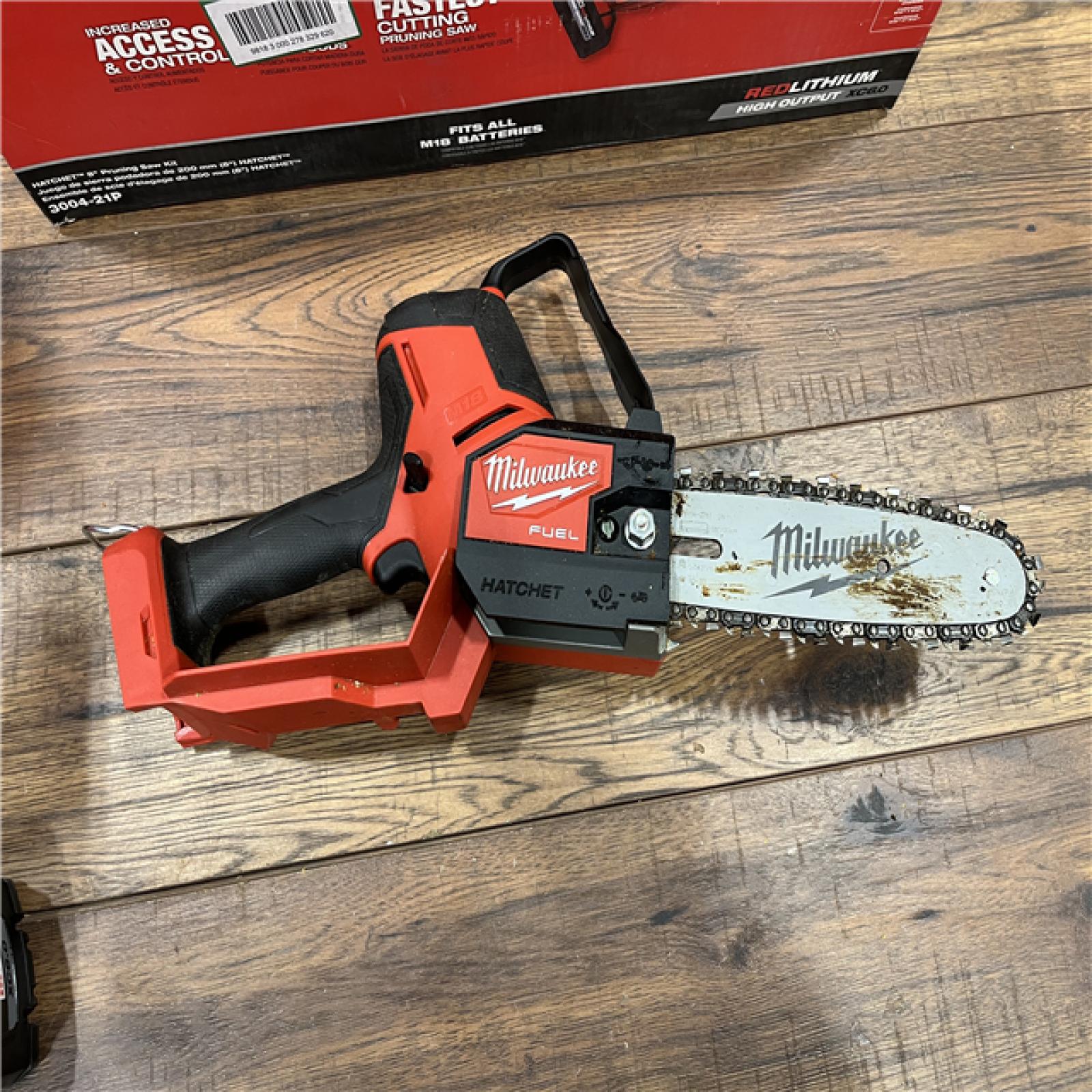 AS-IS MILWAUKEE M18 FUEL 8 in. 18V Lithium-Ion Brushless HATCHET Pruning Saw Kit with 6Ah High Output Battery and Charger