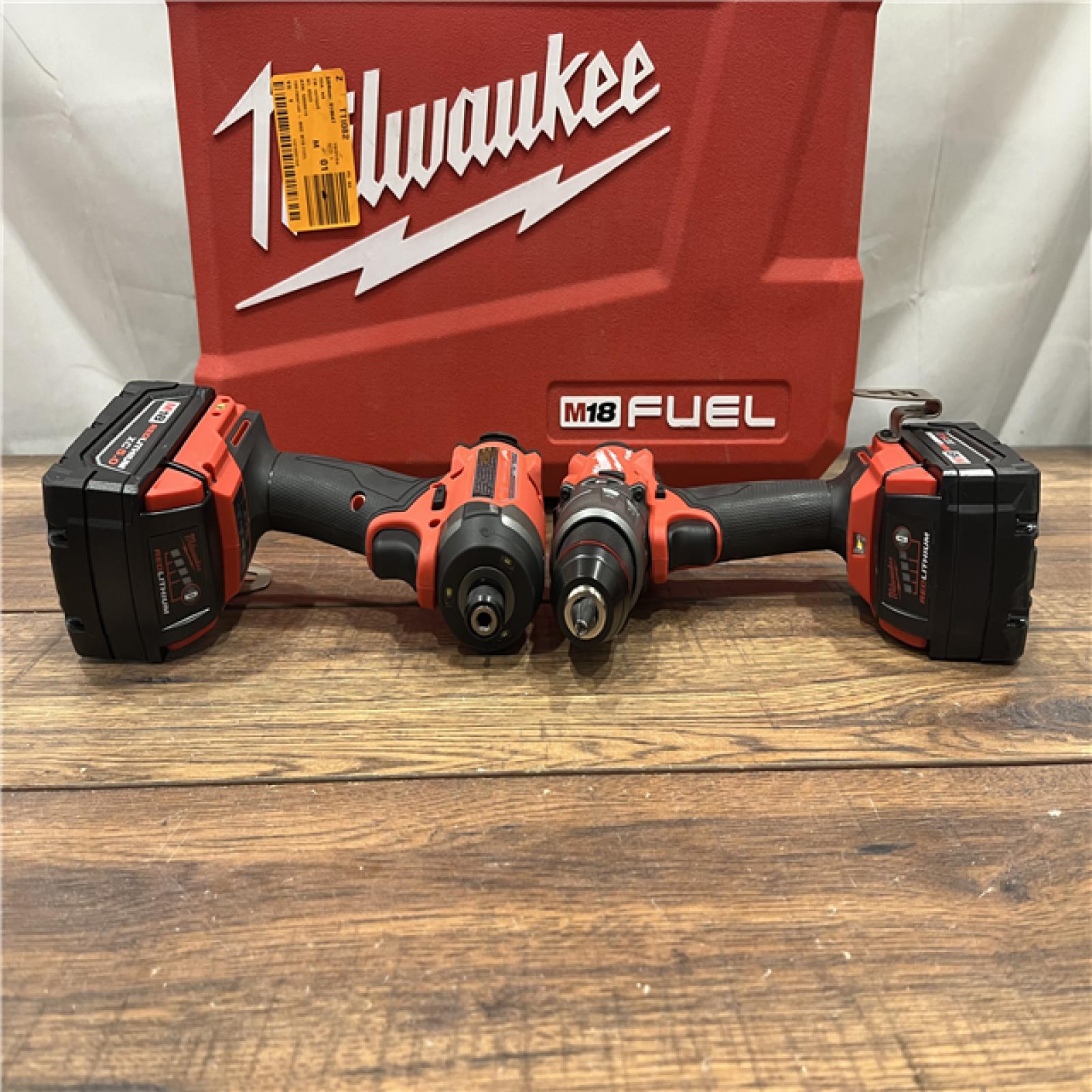 AS-IS Milwaukee M18 FUEL 18V Lithium-Ion Brushless Cordless Hammer Drill and Impact Driver Combo Kit (2-Tool) with 2 Batteries