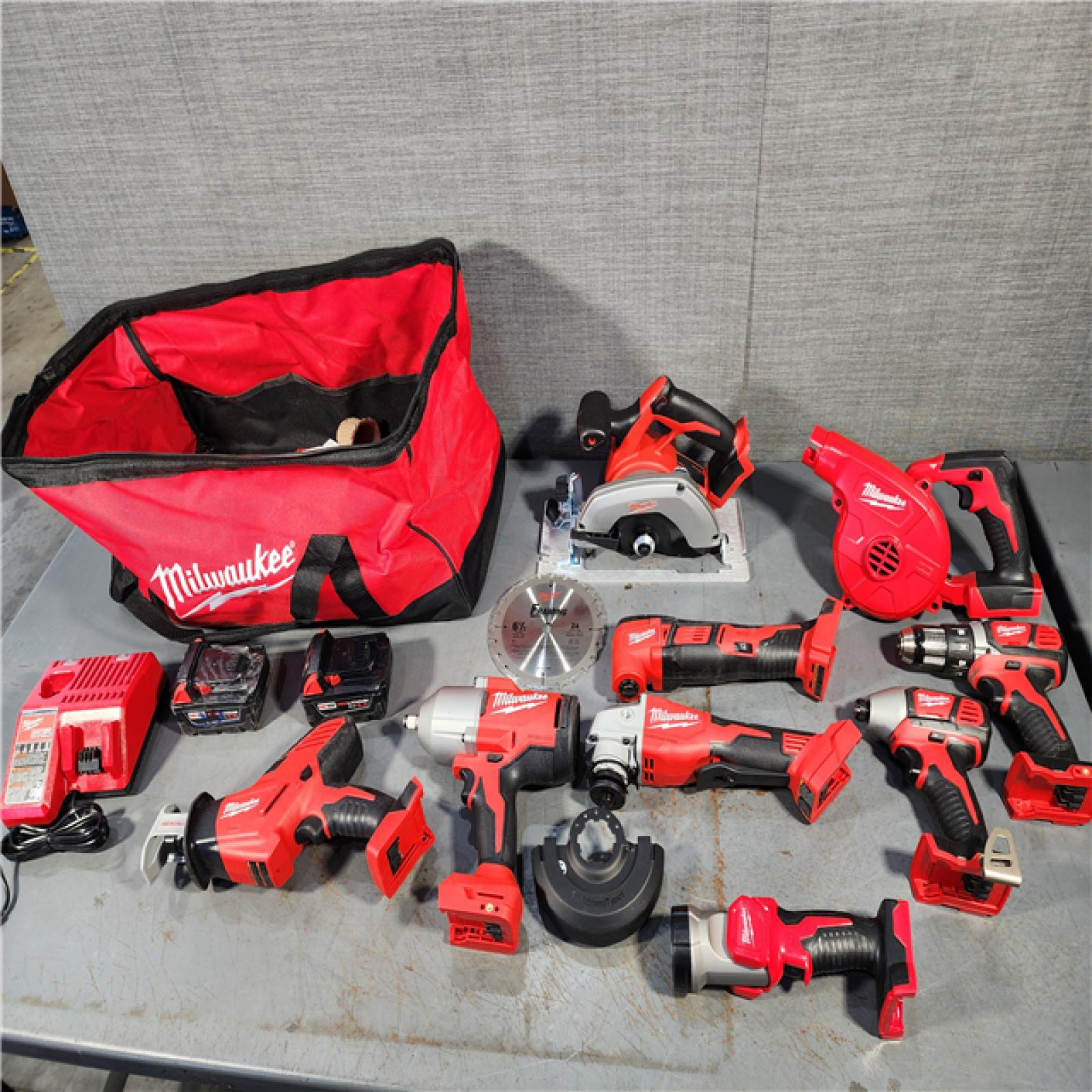 HOUSTON LOCATION - AS-IS M18 18-Volt Lithium-Ion Cordless Combo Kit (9-Tool) with (2) Batteries, Charger, and Tool Bag