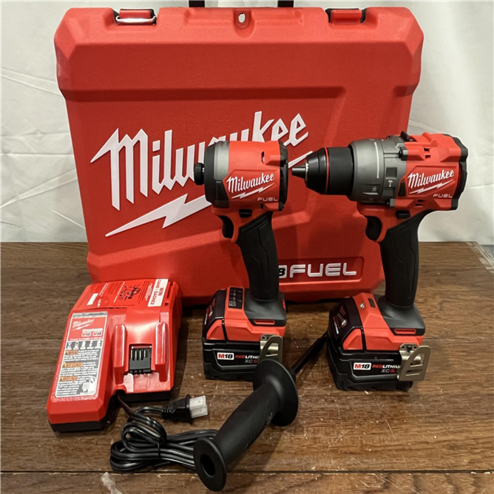 AS-ISMilwaukee M18 FUEL 18V Lithium-Ion Brushless Cordless Hammer Drill and Impact Driver Combo Kit (2-Tool) with 2 Batteries