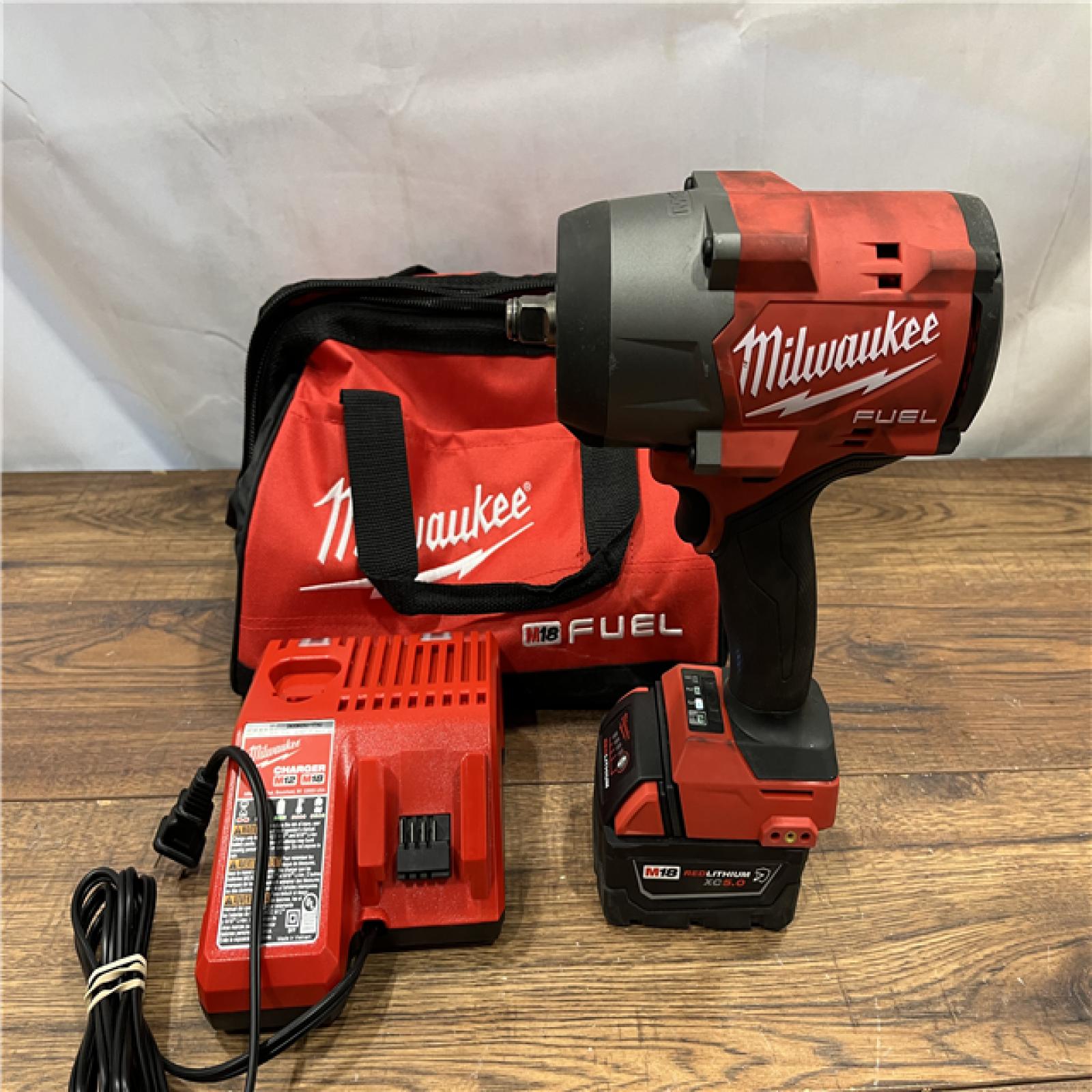 AS IS Milwaukee M18 1/2 in. Cordless Brushless High Torque Impact Wrench Kit (Battery & Charger)