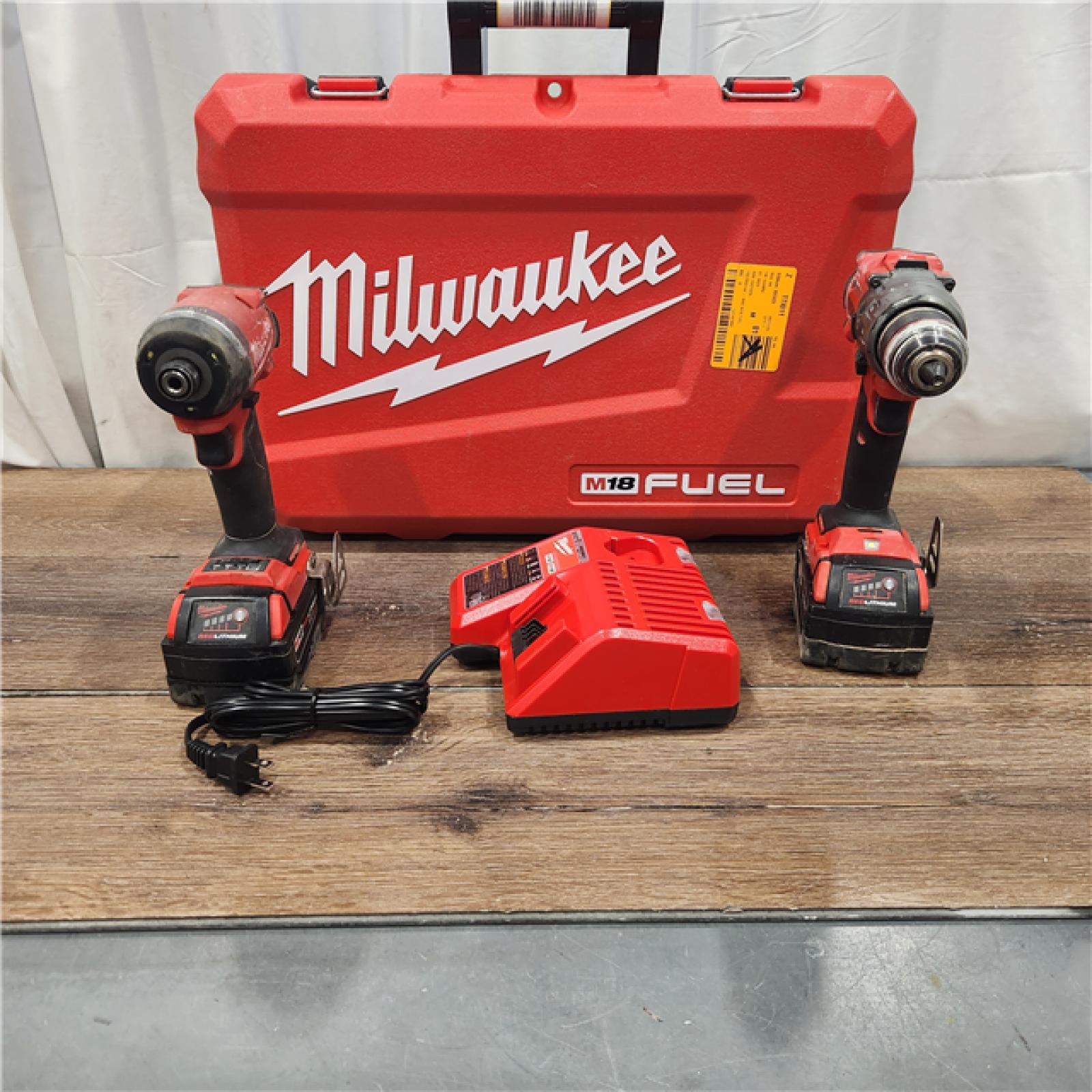 AS IS Milwaukee M18 FUEL 18V Lithium-Ion Brushless Cordless Hammer Drill and Impact Driver Combo Kit (2-Tool) with 2 Batteries