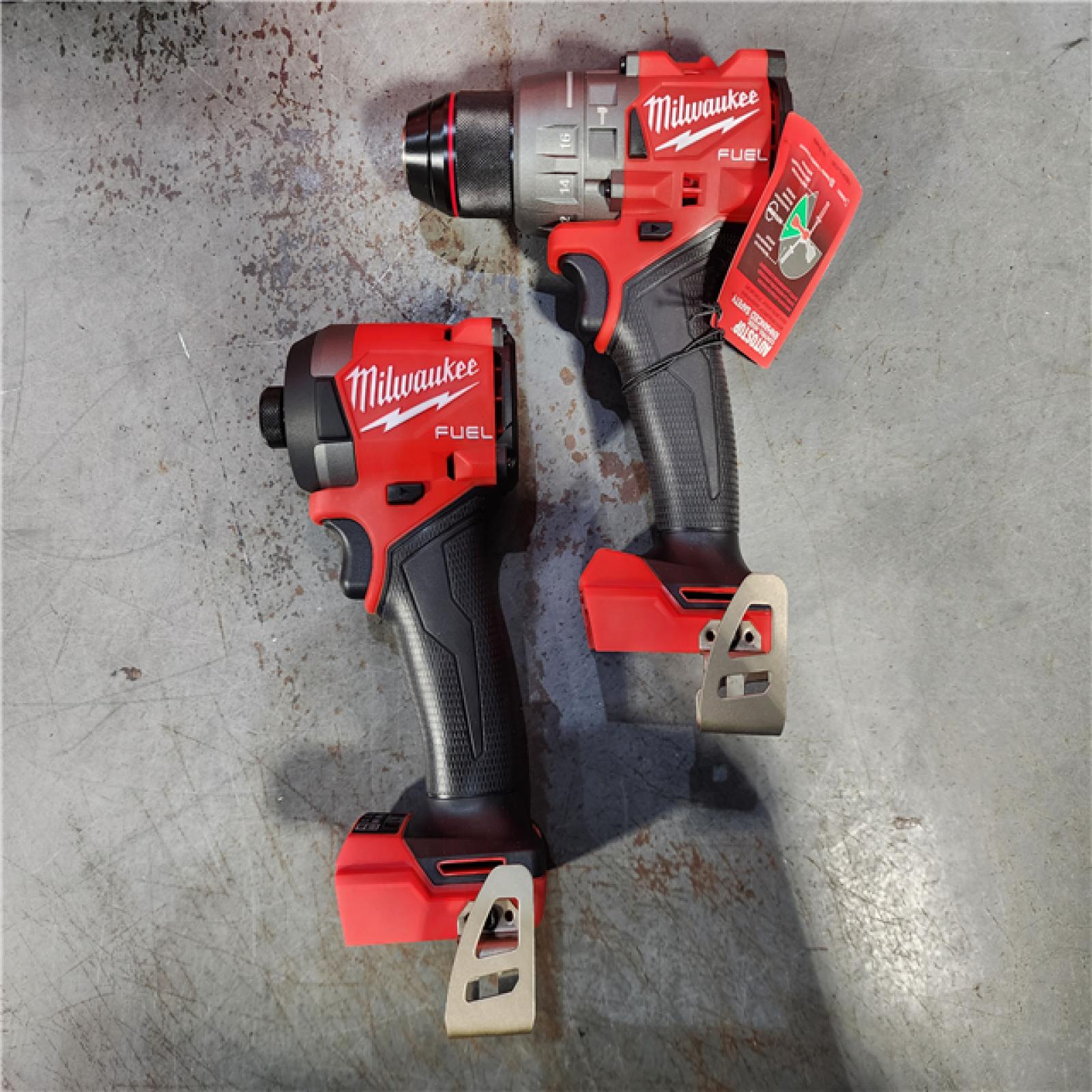 HOUSTON LOCATION - AS-IS (APPEARS LIKE NEW) Milwaukee M18 FUEL 18V Lithium-Ion Brushless Cordless Hammer Drill and Impact Driver Combo Kit (2-Tool) with 2 Batteries