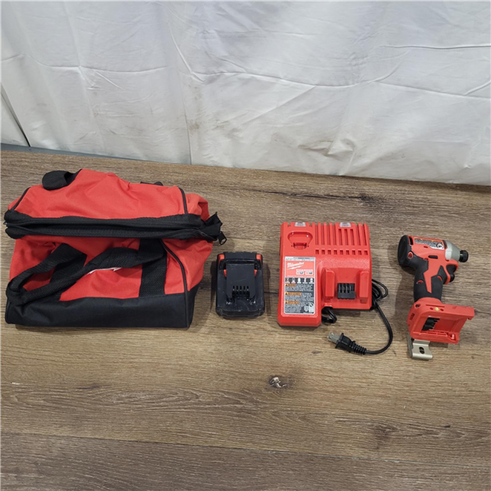 AS-IS Milwaukee M18 Compact Brushless 1/4  Hex Impact Driver Kit