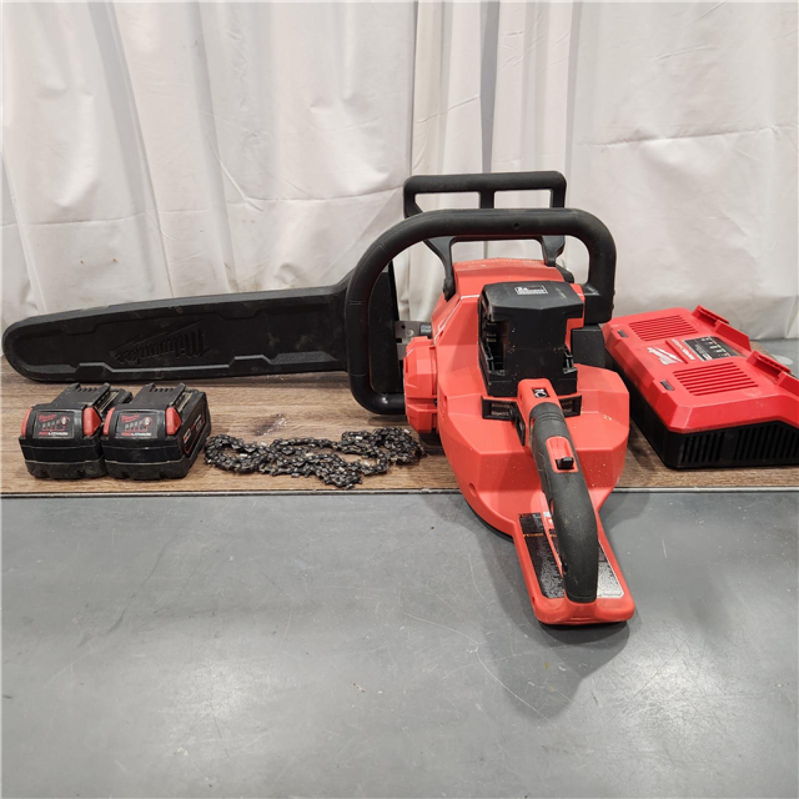 AS IS Milwaukee M18 FUEL Cordless 20 in. Chainsaw Kit