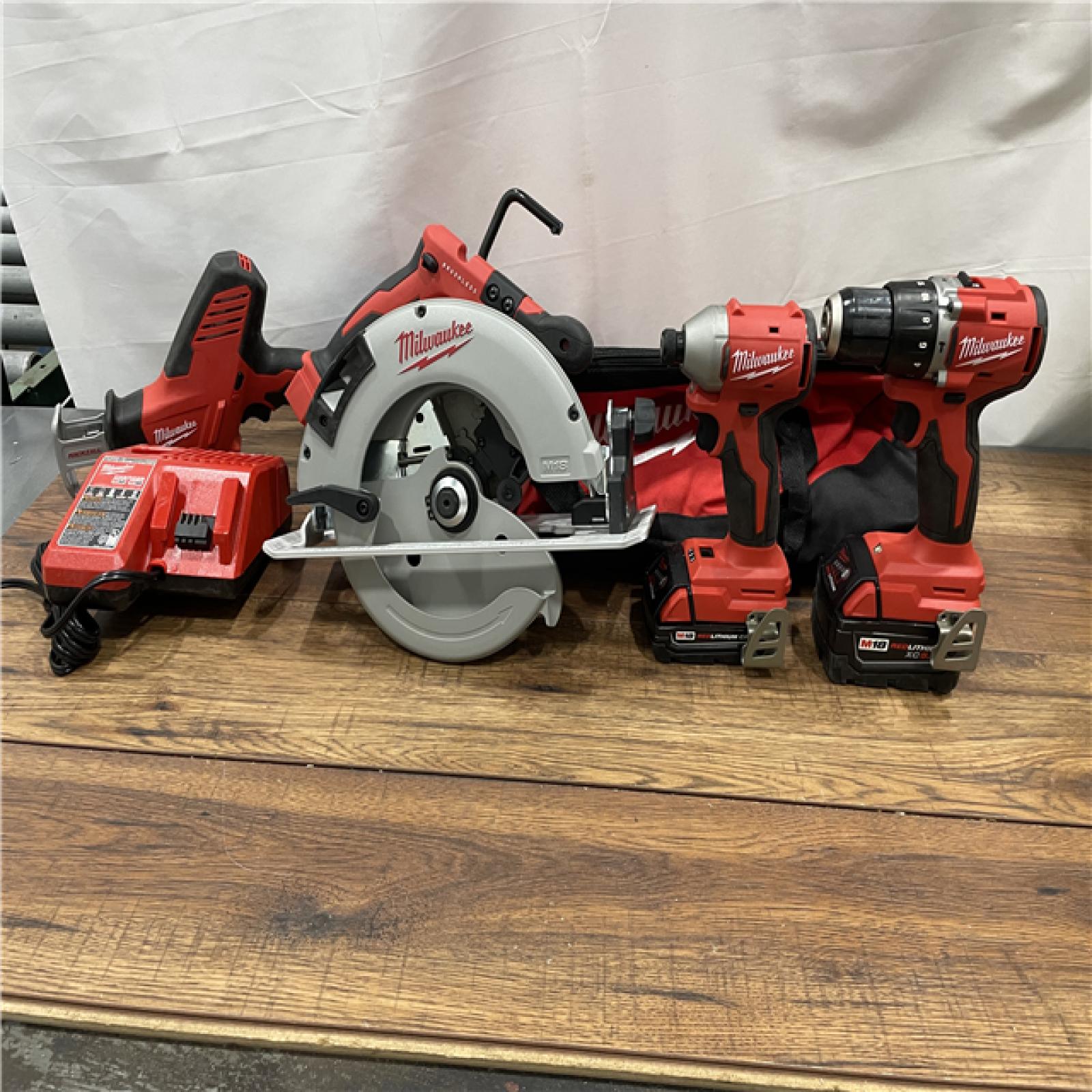 AS-IS Milwaukee M18 18-Volt Lithium-Ion Brushless Cordless Combo Kit (4-Tool)