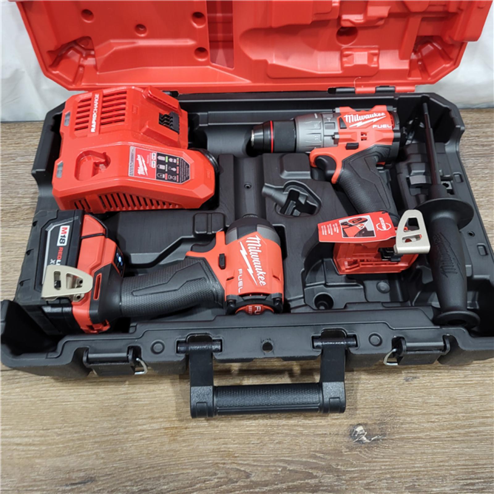 AS-IS M18 FUEL 18V Lithium-Ion Brushless Cordless Hammer Drill and Impact Driver Combo Kit (2-Tool) with 2 Batteries