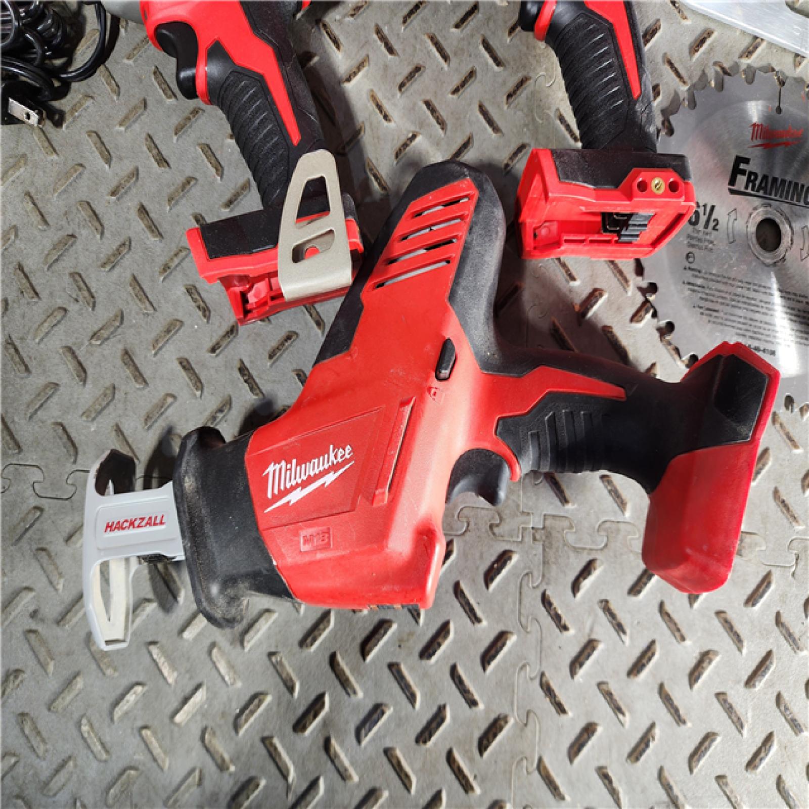 HOUSTON LOCATION - AS-IS Milwaukee M18 18-Volt Lithium-Ion Cordless Combo Tool Kit (5-Tool) with (1) 3.0Ah and (1) 1.5Ah Battery, (1) Charger, (1) Tool Bag