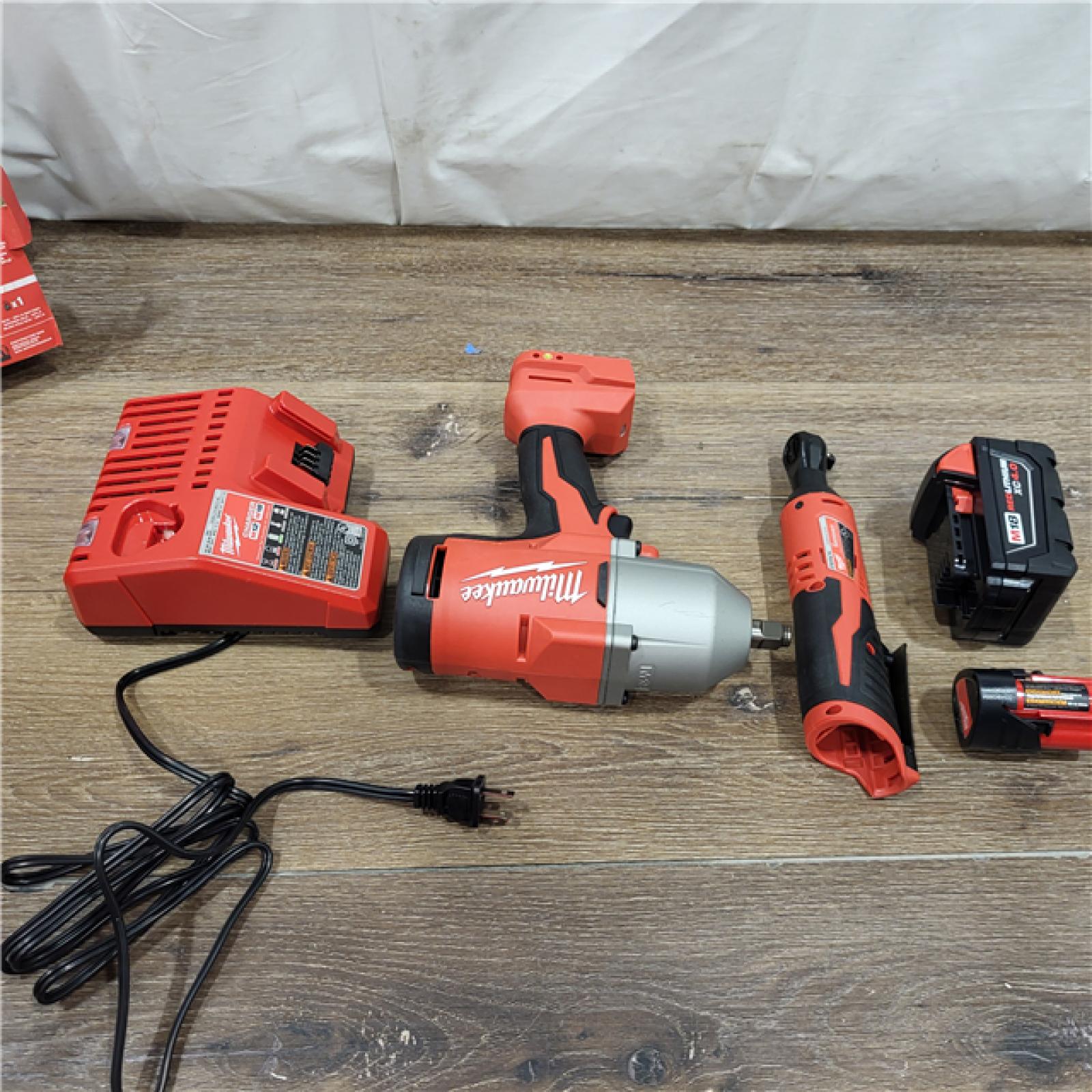 AS-IS M12/M18 12/18V Lithium-Ion Cordless 3/8 in. Ratchet and 1/2 in. High Torque Impact Wrench with Friction Ring Combo Kit