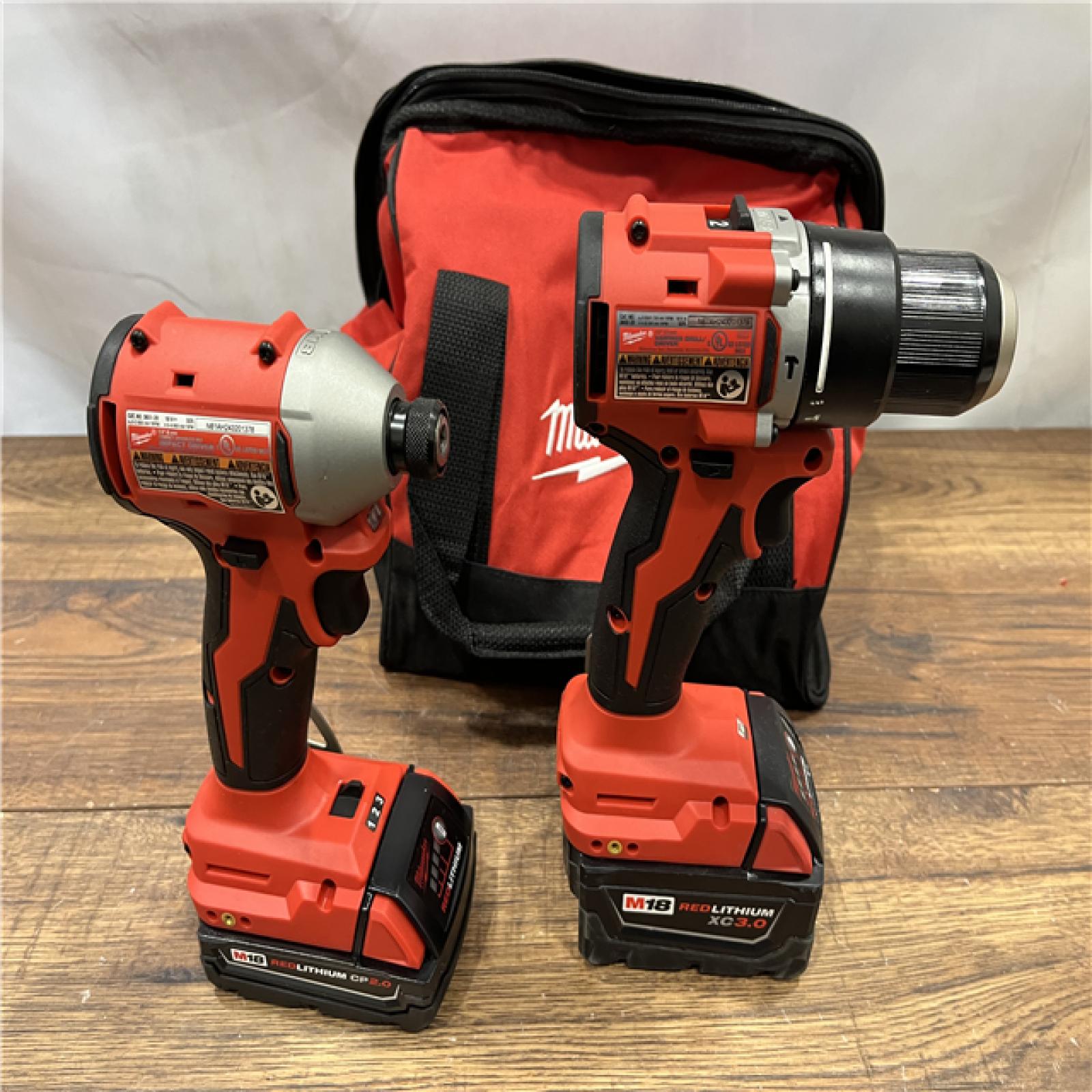 AS IS M18 18-Volt Lithium-Ion Brushless Cordless Compact Hammer Drill/Impact Combo Kit (2-Tool) with (2) Batteries, Bag