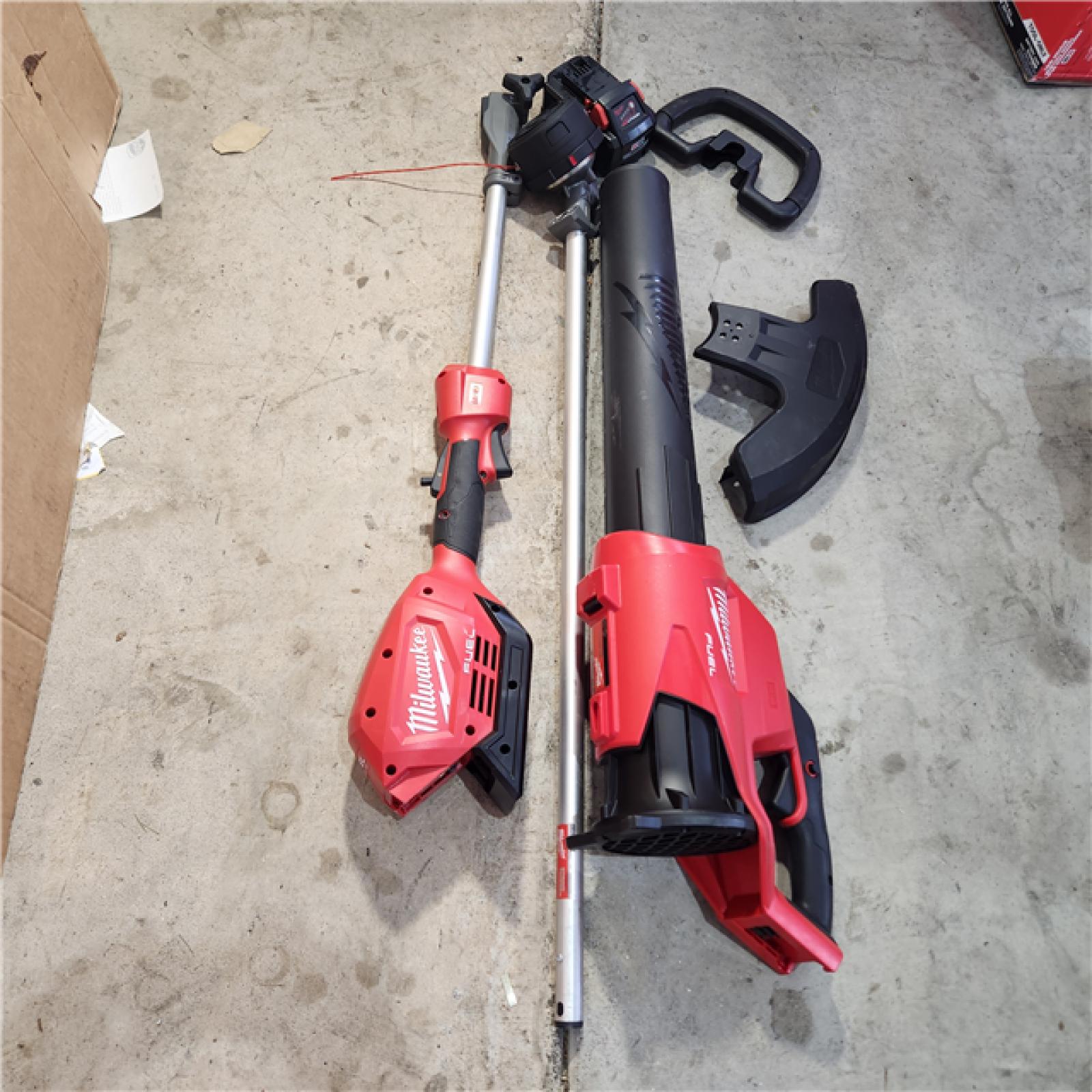 Houston location AS-IS MILWAUKEE M18 FUEL 18V Lithium-Ion Brushless Cordless QUIK-LOK String Trimmer/Blower Combo Kit with Battery  (2-Tool) NO CHANGER