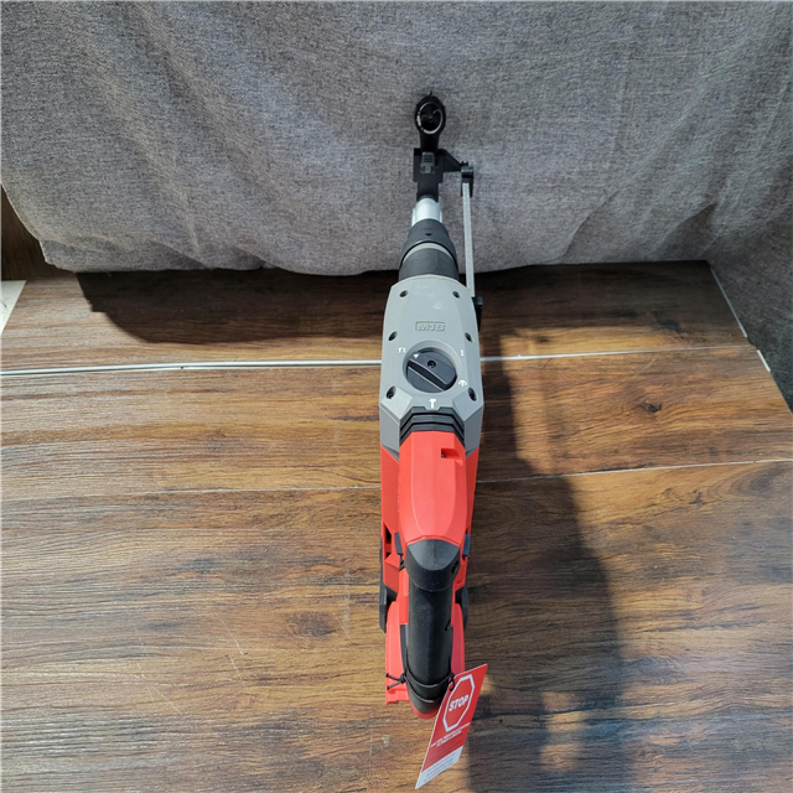 CALIFORNIA AS-IS MILWAUKEE M18 FUEL HAMMERVAC AND ROTARY HAMMER(BATTERY AND CHARGER INCLUDED)