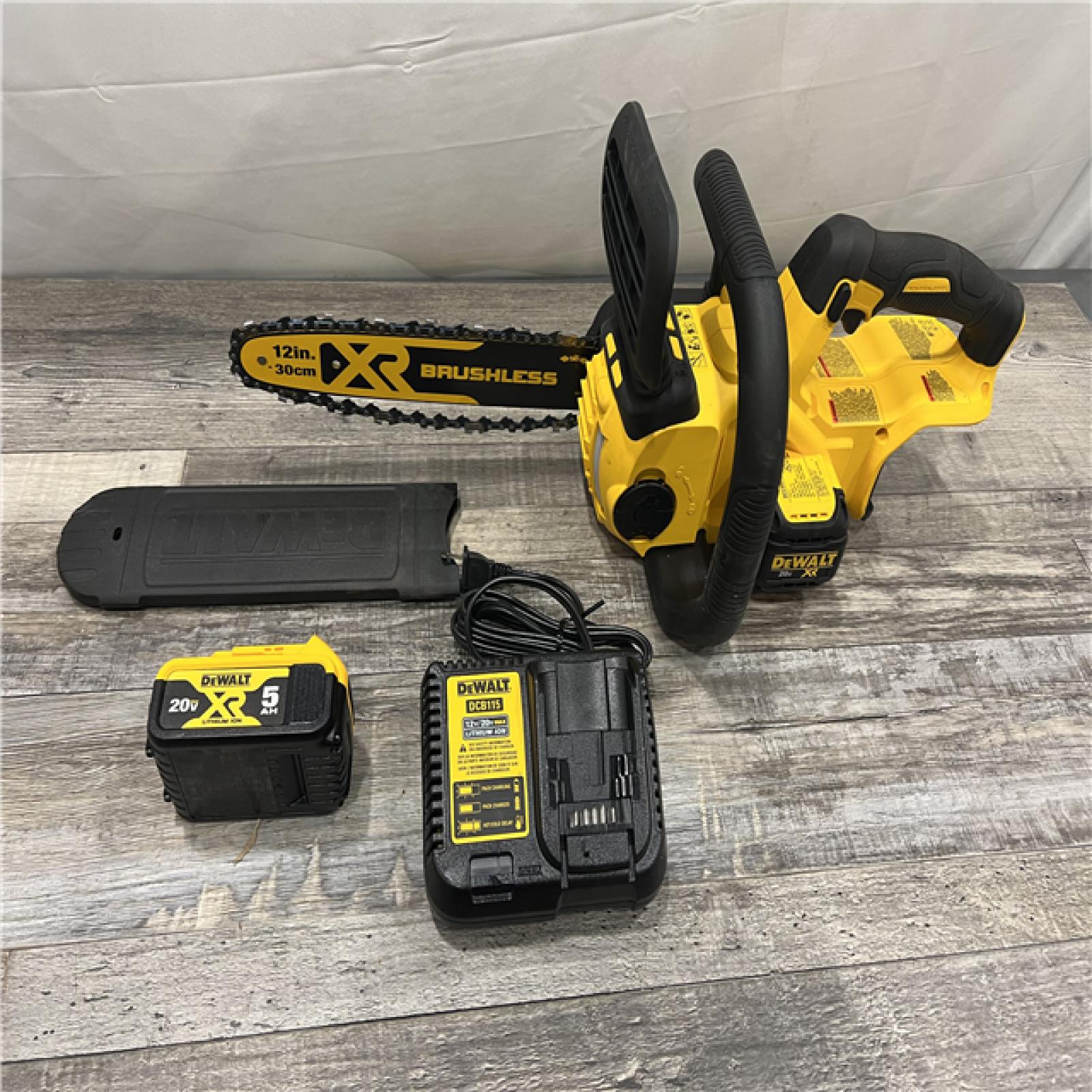 AS-IS Dewalt 7605686 12 in. 20V Battery Powered Chainsaw