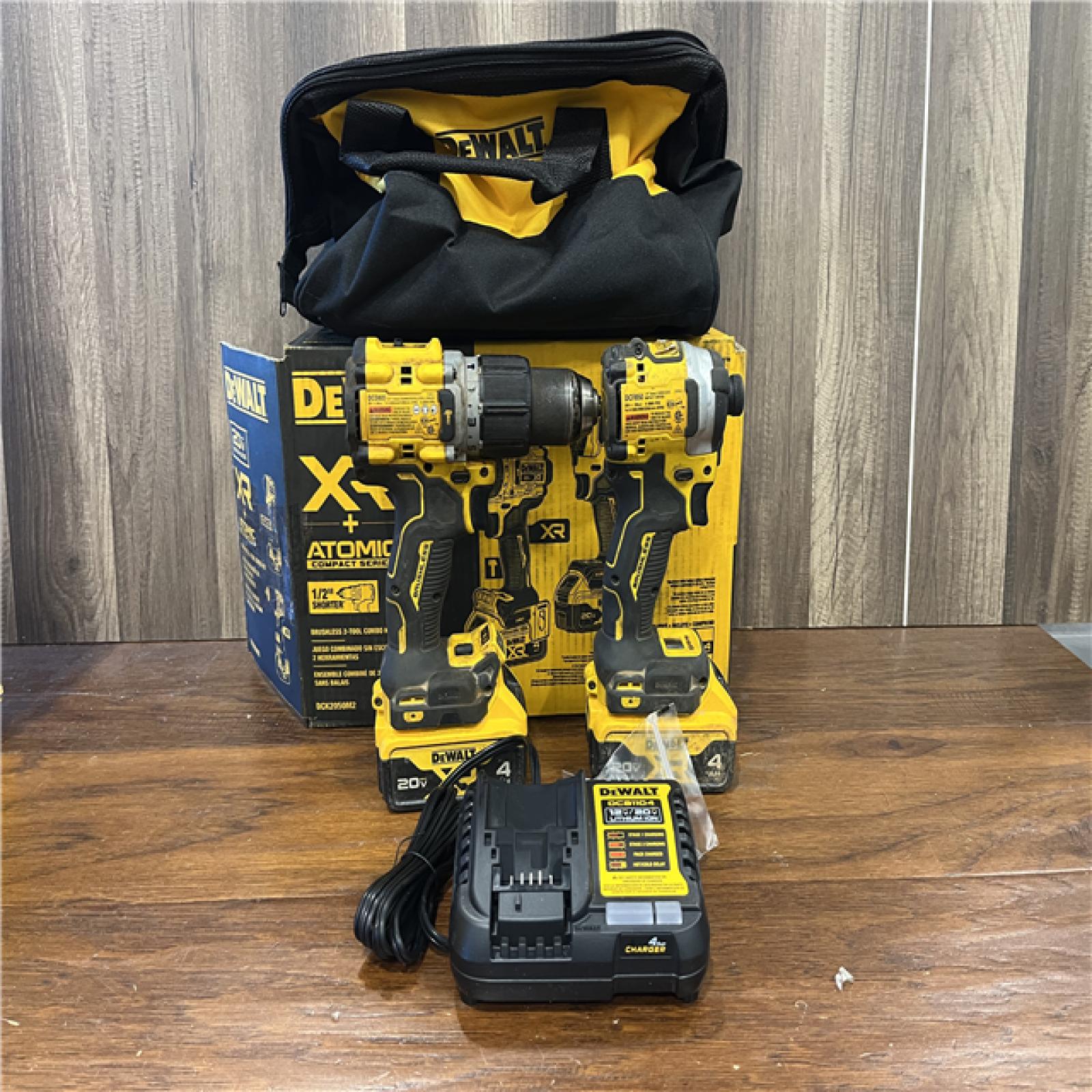 AS-IS DEWALT 20V MAX XR Hammer Drill and ATOMIC Impact Driver 2 Tool Cordless Combo Kit with (2) 4.0Ah Batteries, Charger, and Bag