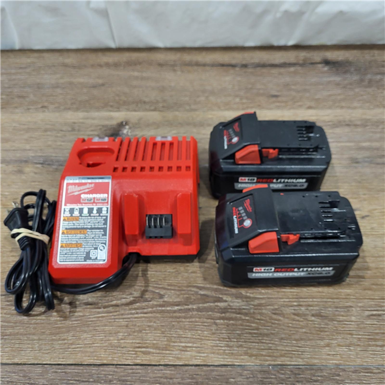 AS-IS Milwaukee M18 18-Volt Lithium-Ion High Output Starter Kit with Two 6.0 Ah Battery and Charger