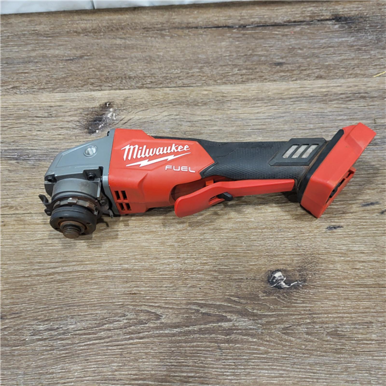 AS-IS Milwaukee 2880-20 M18 FUEL 18-Volt Lithium-Ion Brushless Cordless 4-1/2 in./5 in. Grinder W/Paddle Switch (Tool-Only)