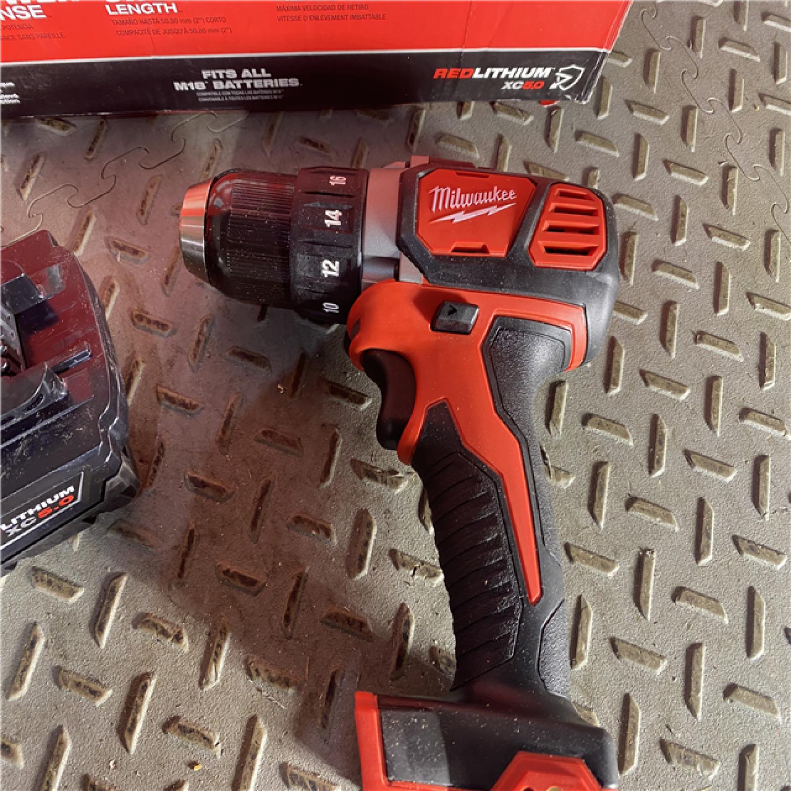 HOUSTON LOCATION - AS-IS Milwaukee M18 FUEL 1/2 High Torque Impact Wrench with Friction Ring Kit