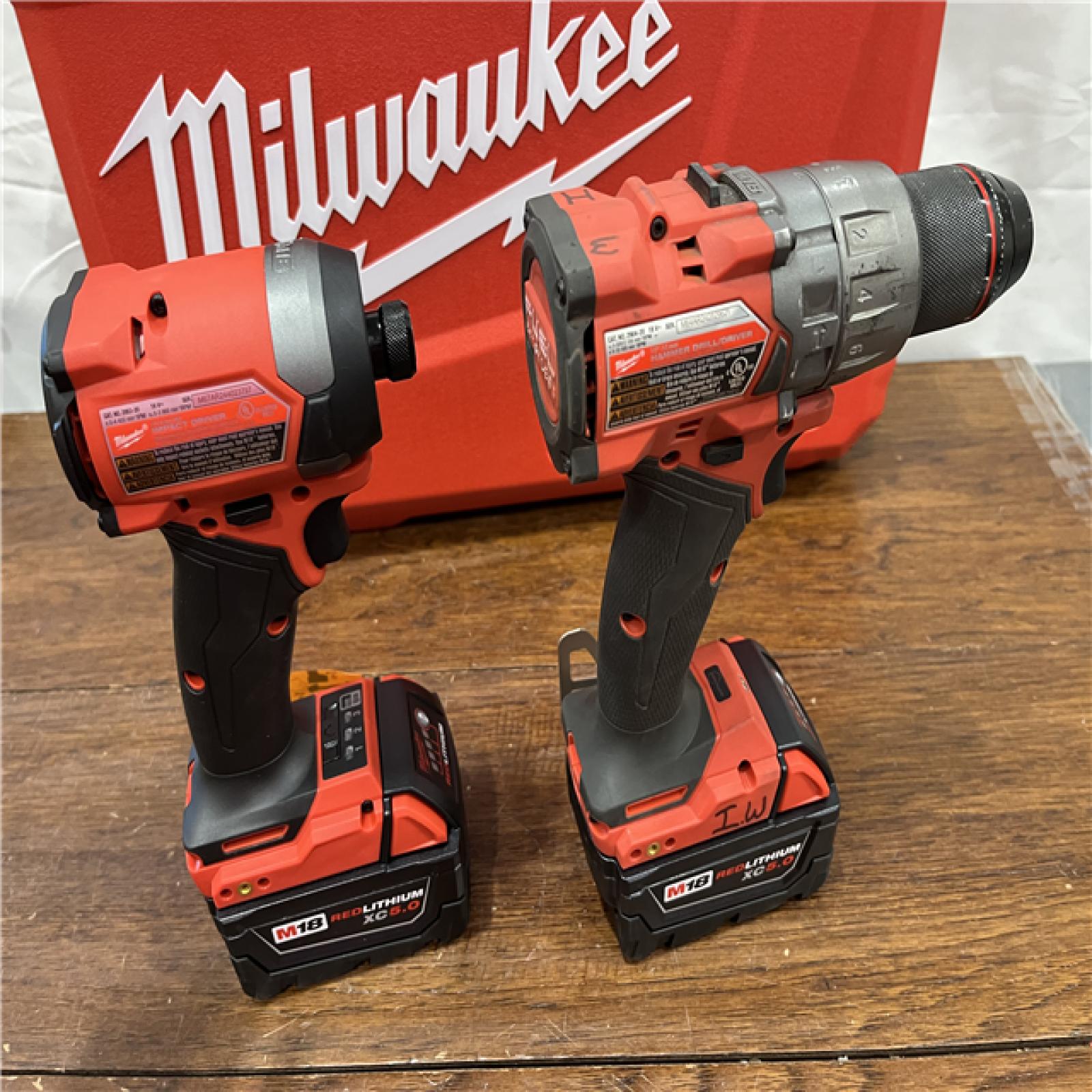 AS-IS Milwaukee M18 FUEL 18V Lithium-Ion Brushless Cordless Hammer Drill and Impact Driver Combo Kit (2-Tool) with 2 Batteries