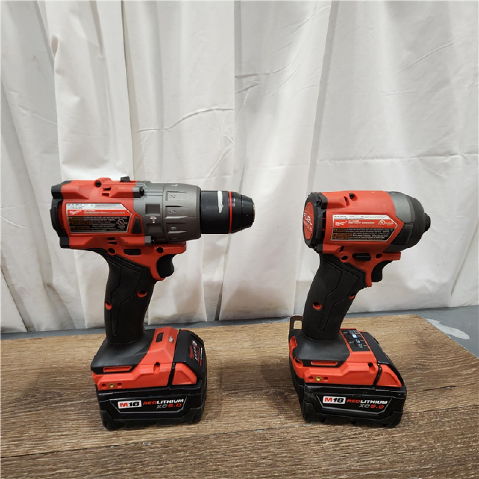 AS-IS Milwaukee M18 FUEL 18V Lithium-Ion Brushless Cordless Hammer Drill and Impact Driver Combo Kit (2-Tool) with 2 Batteries